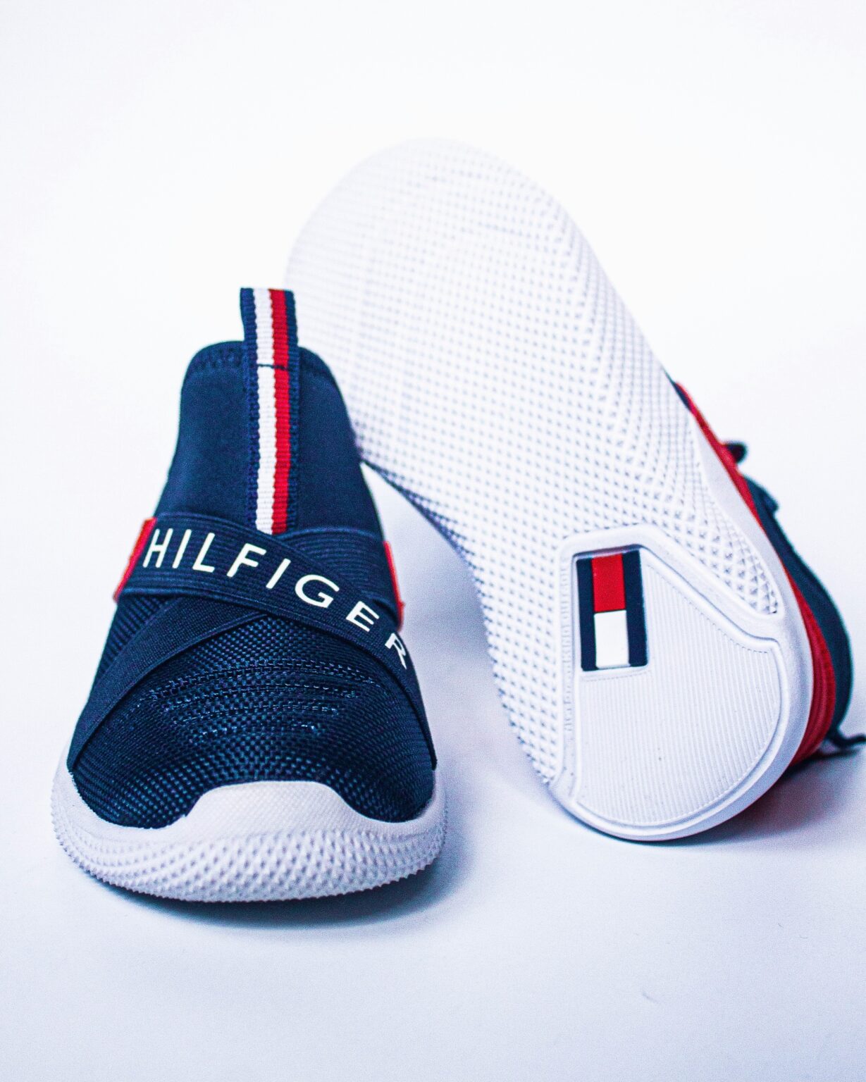 Tommy Hilfiger Logo Meaning, History, Design Influences, and Evolution