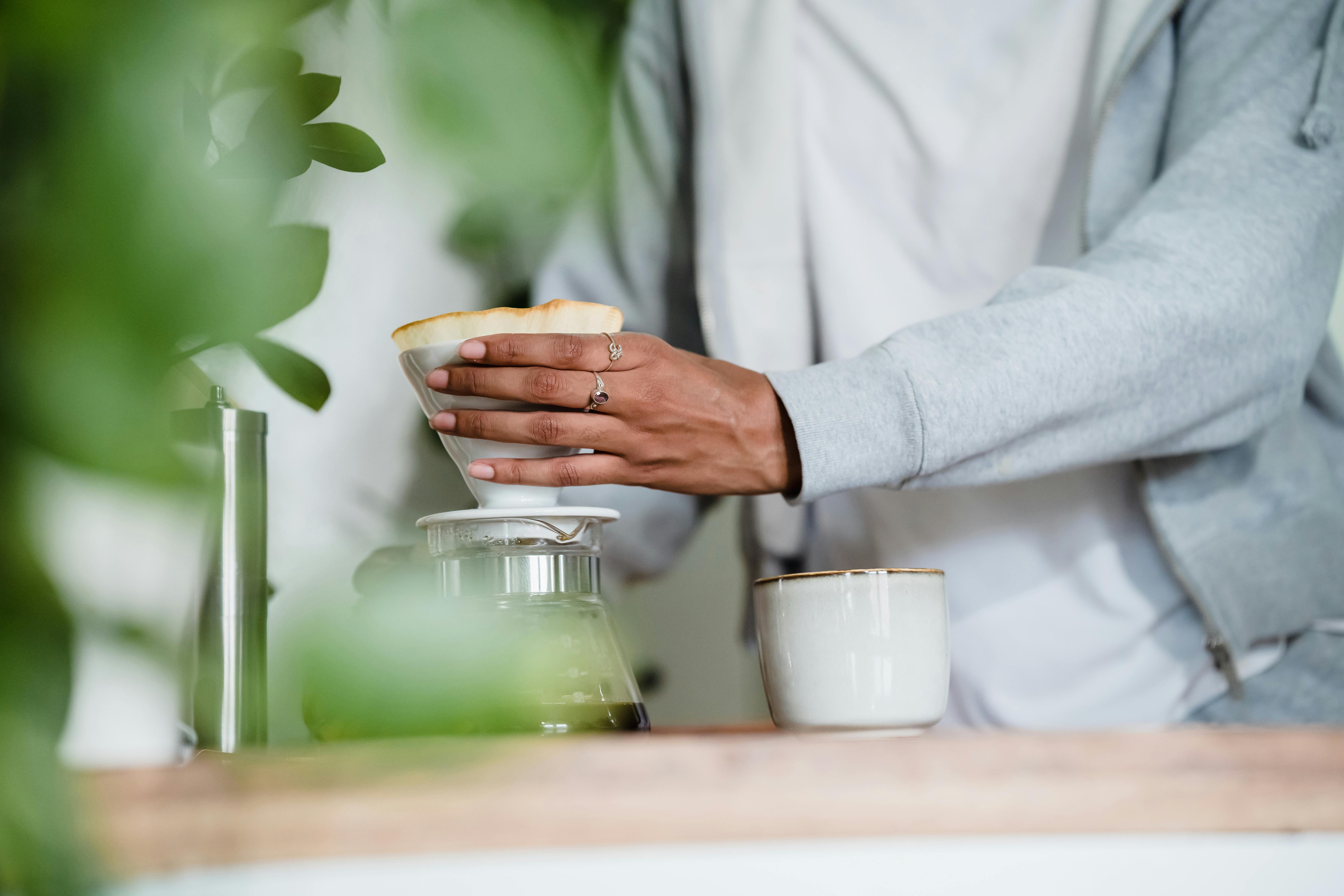 Close up of a Woman Making Coffee