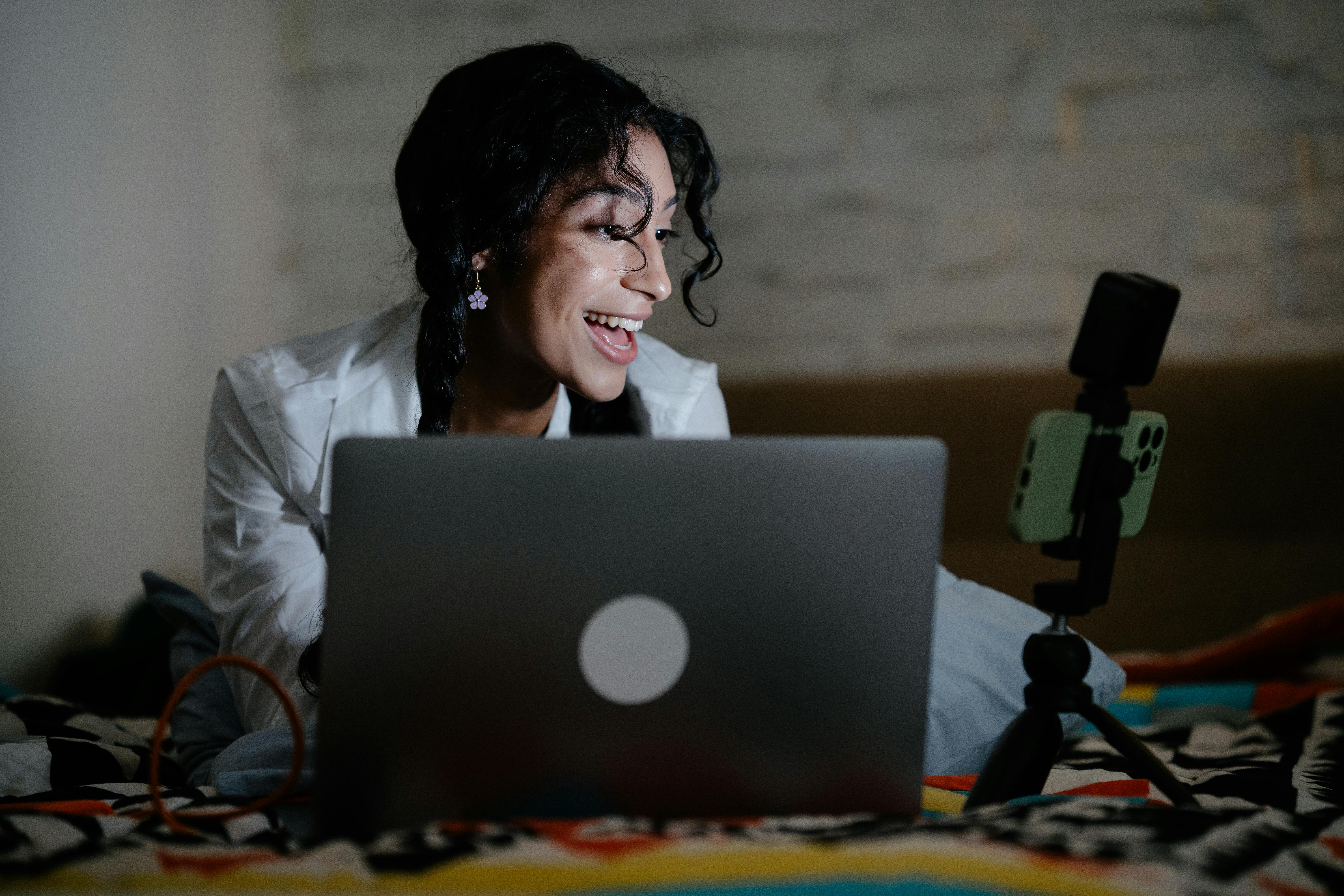 Woman while Recording with Smartphone