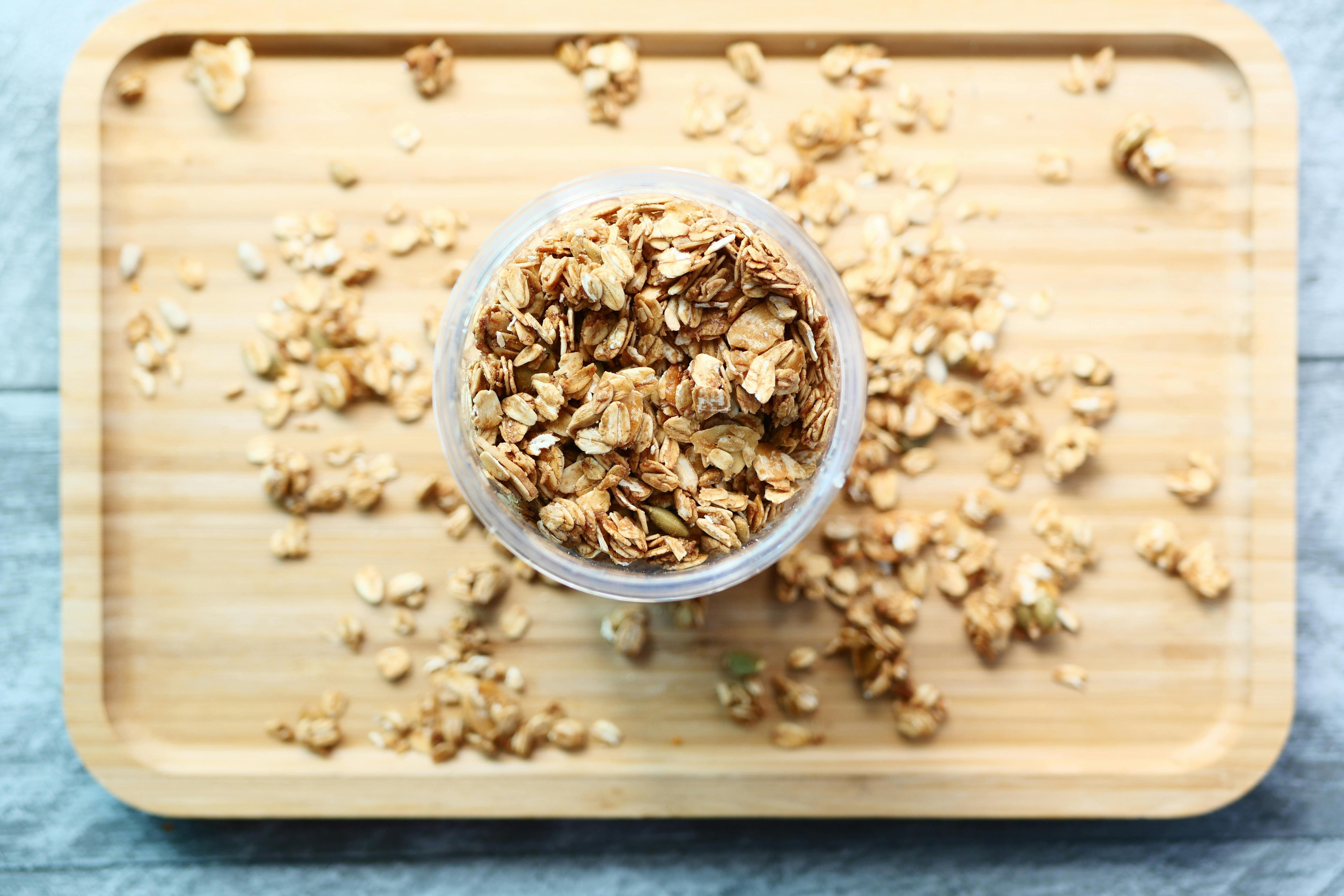 Cereal in Glass Jar on Board