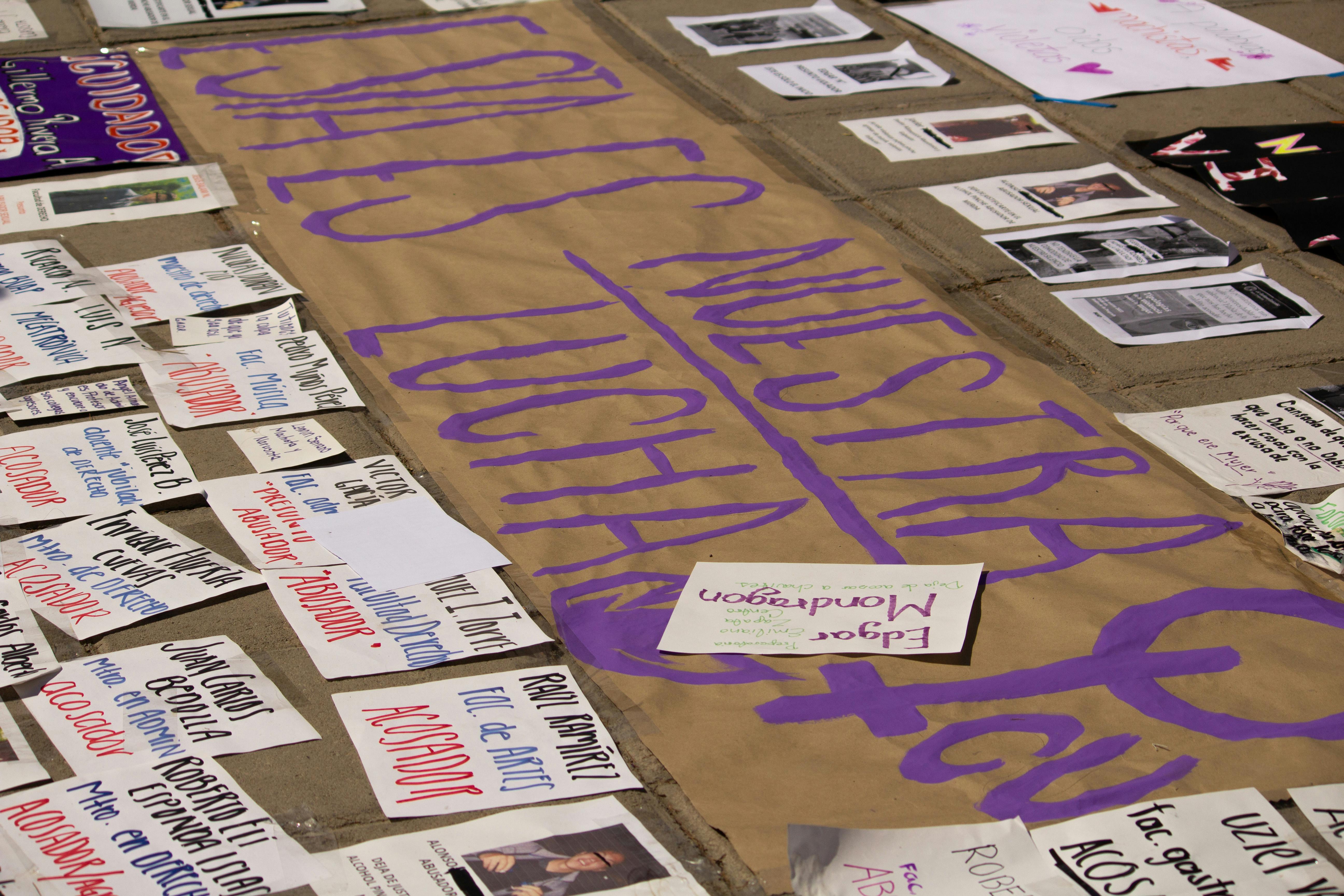 Close-up of Signs Lying on the Ground at a Protest