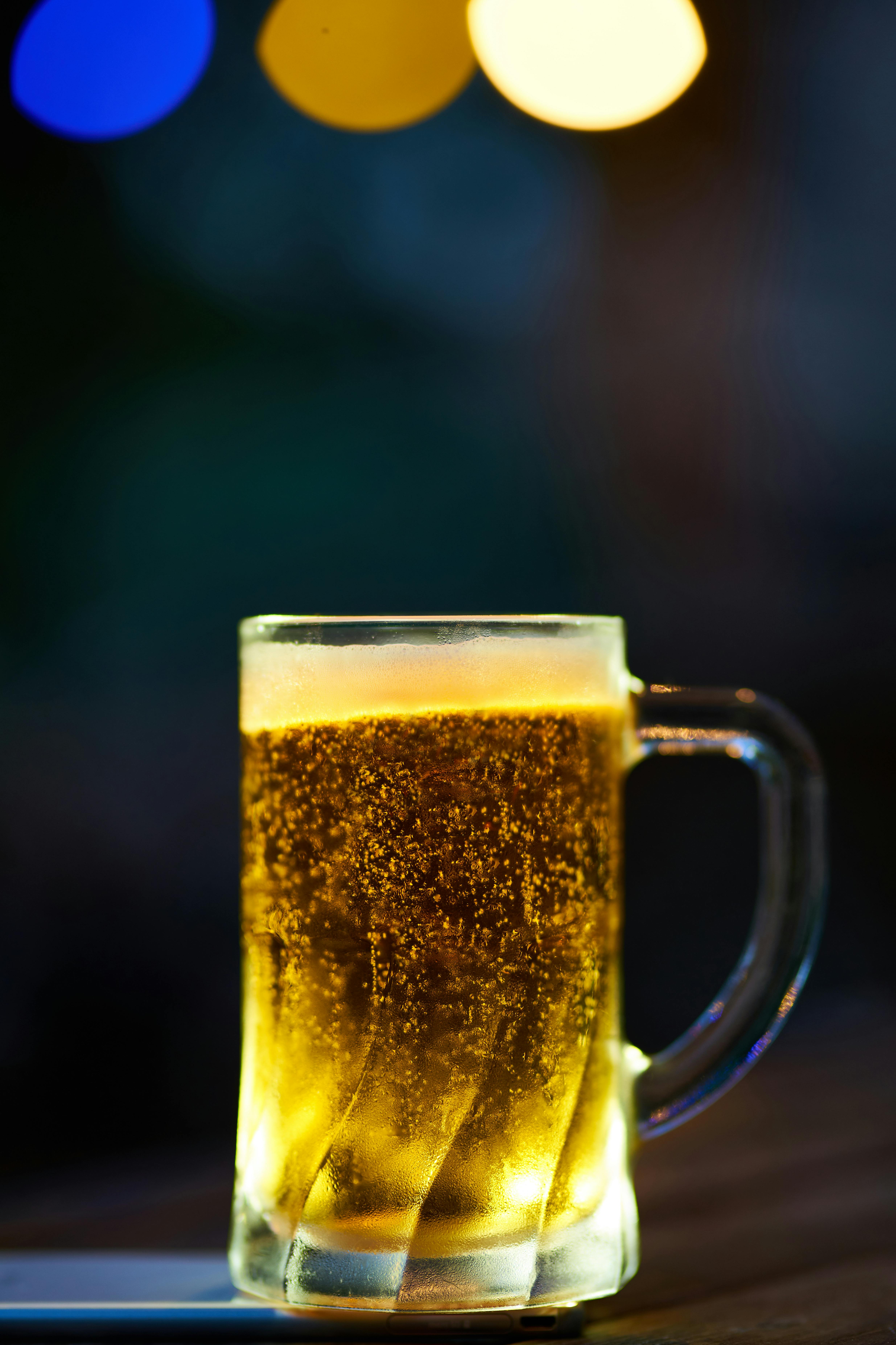 Clear Glass Mug Filled With Yellow Liquid