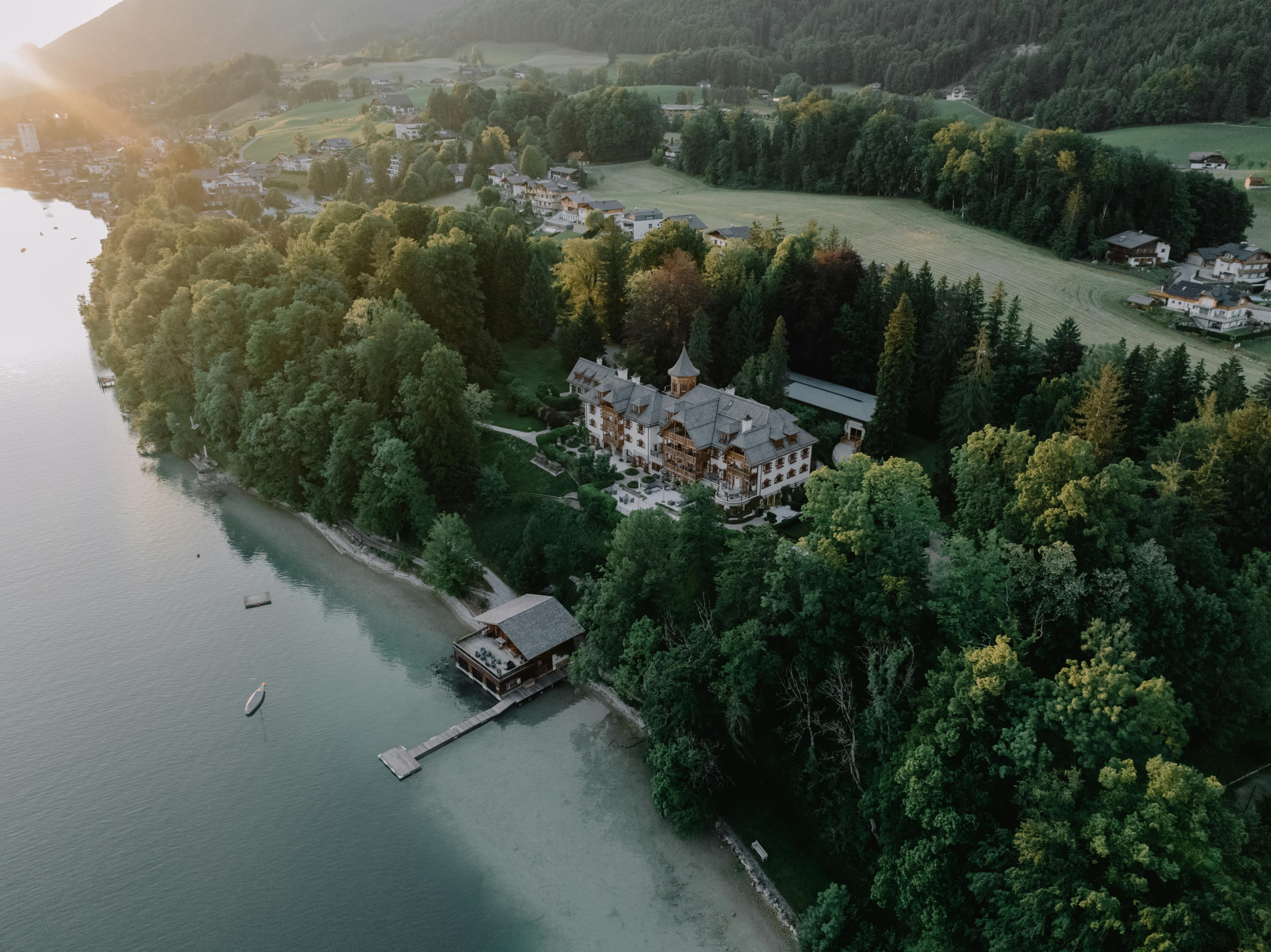 Drone Shot of a Residence in the Woods on the Shore of Lake Wolfgang, Salzburg, Austria