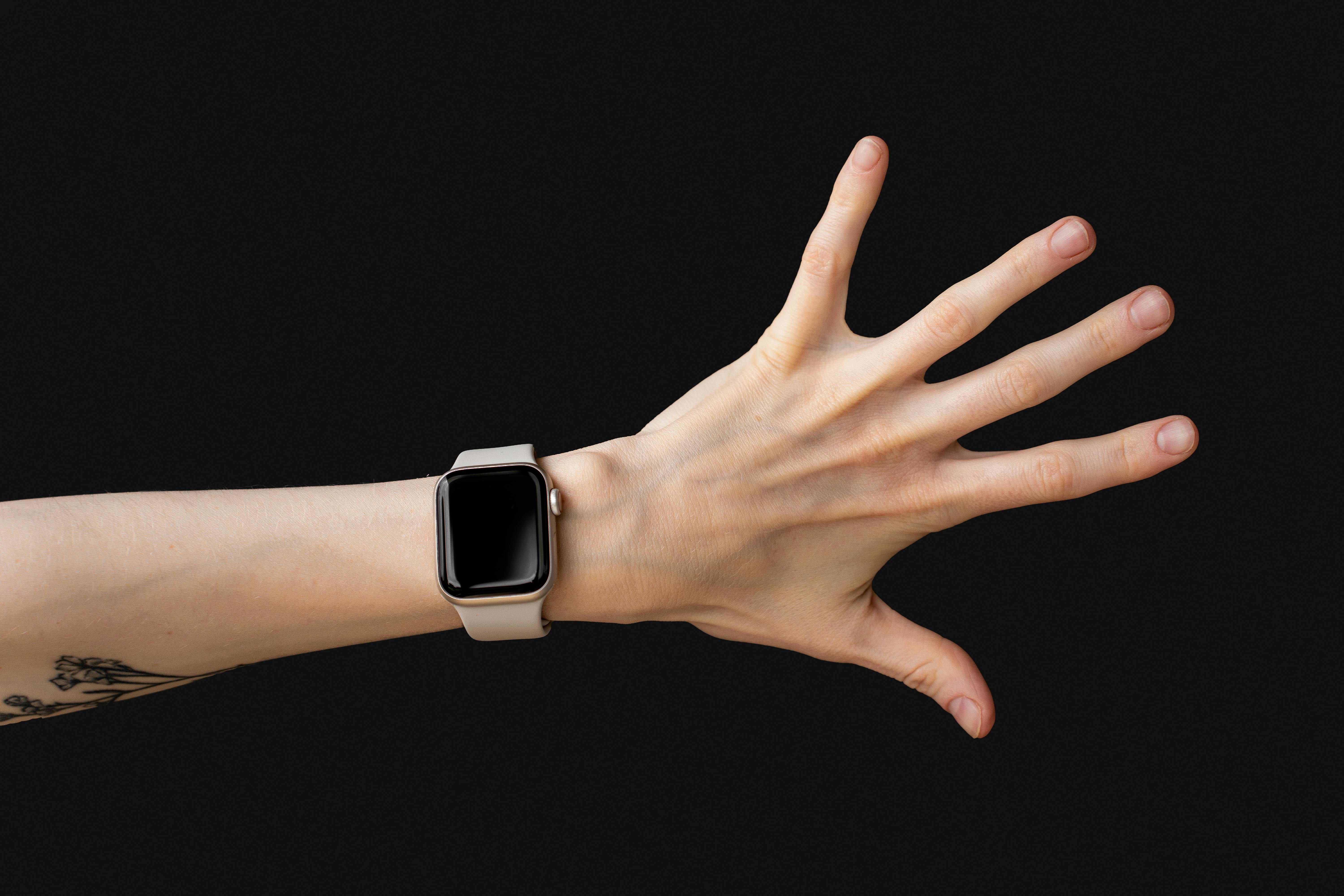 Woman with an Electric Watch on a Hand