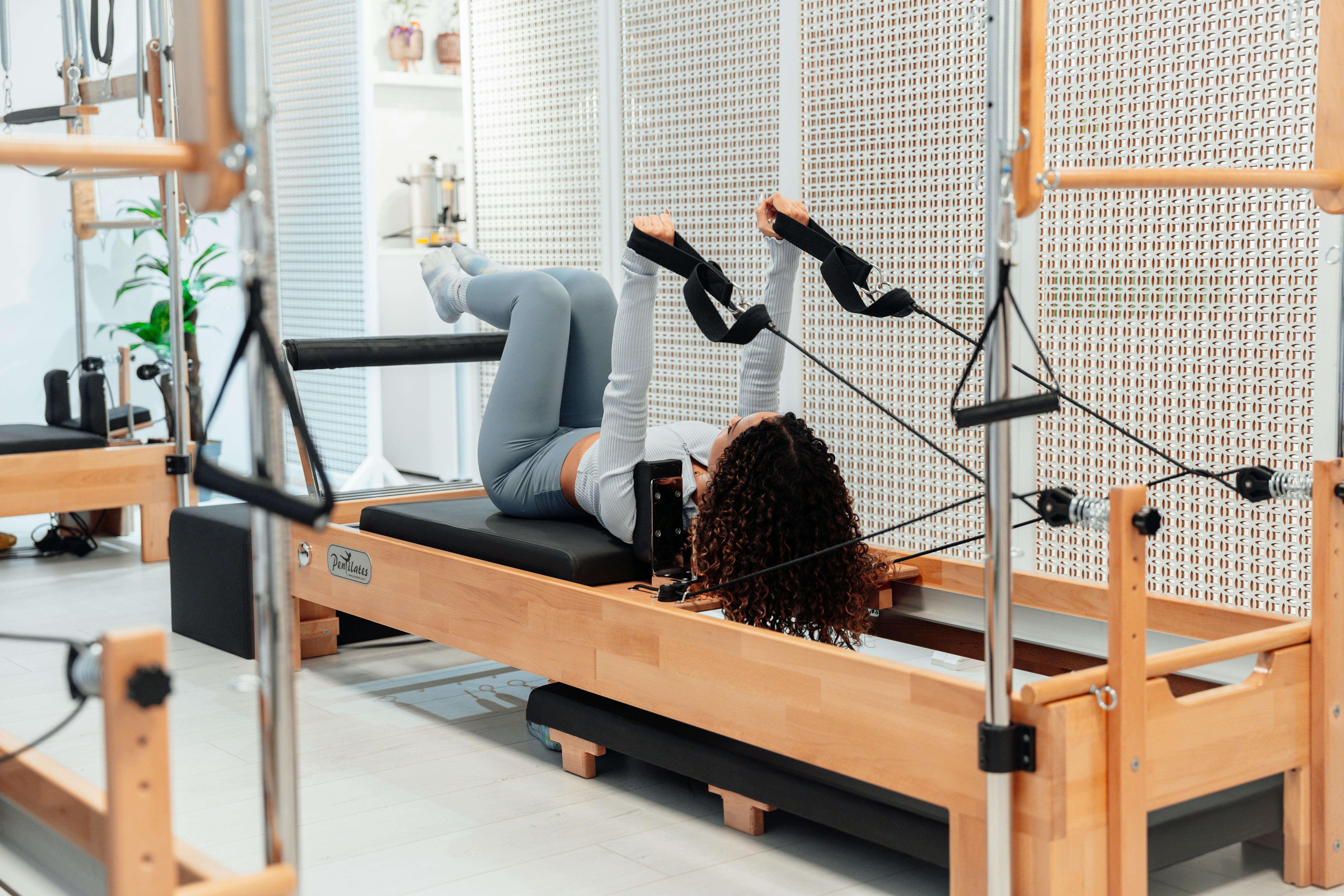 Woman on a Pilates Tower