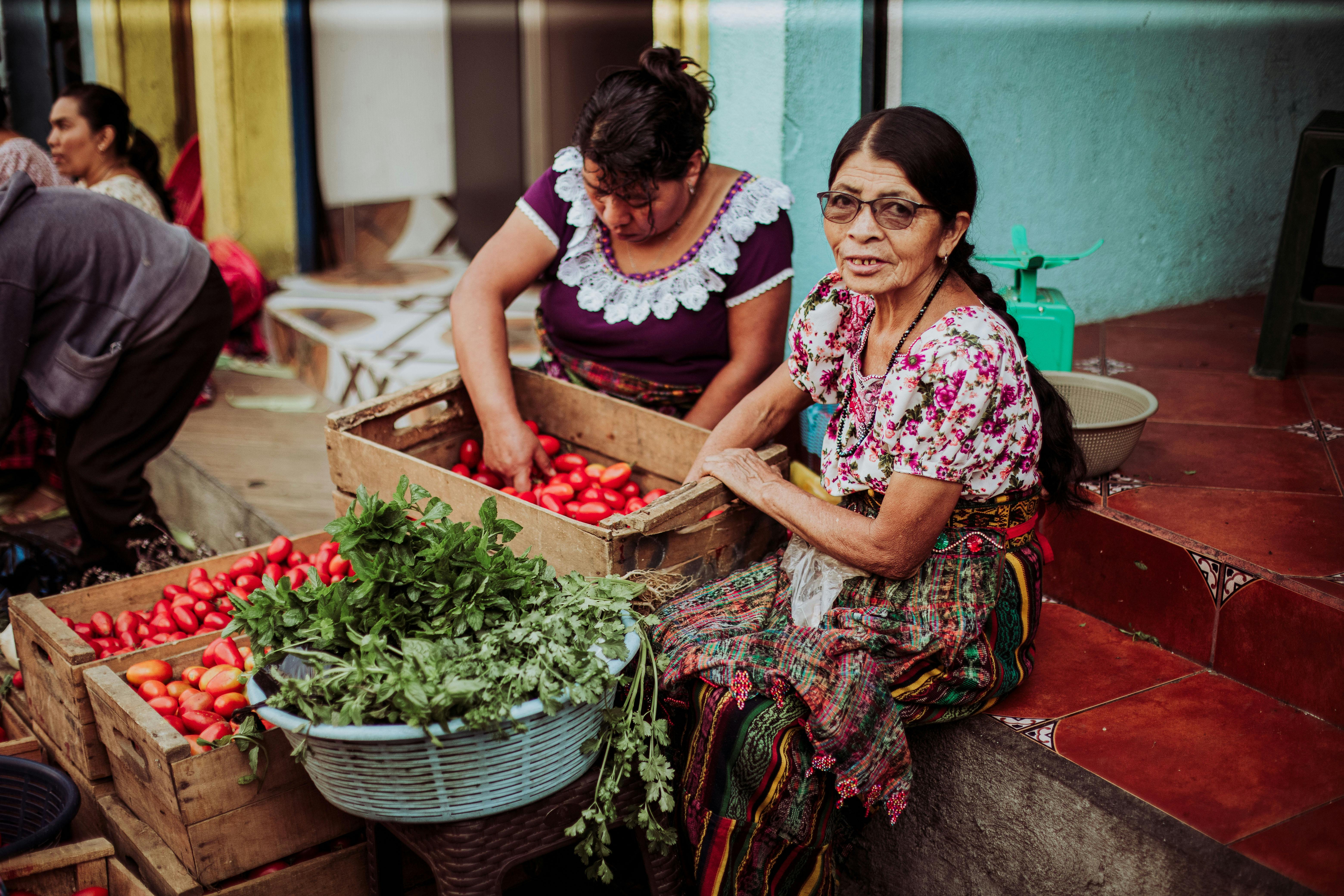 Merchants with Wooden Crates of Tomatoes