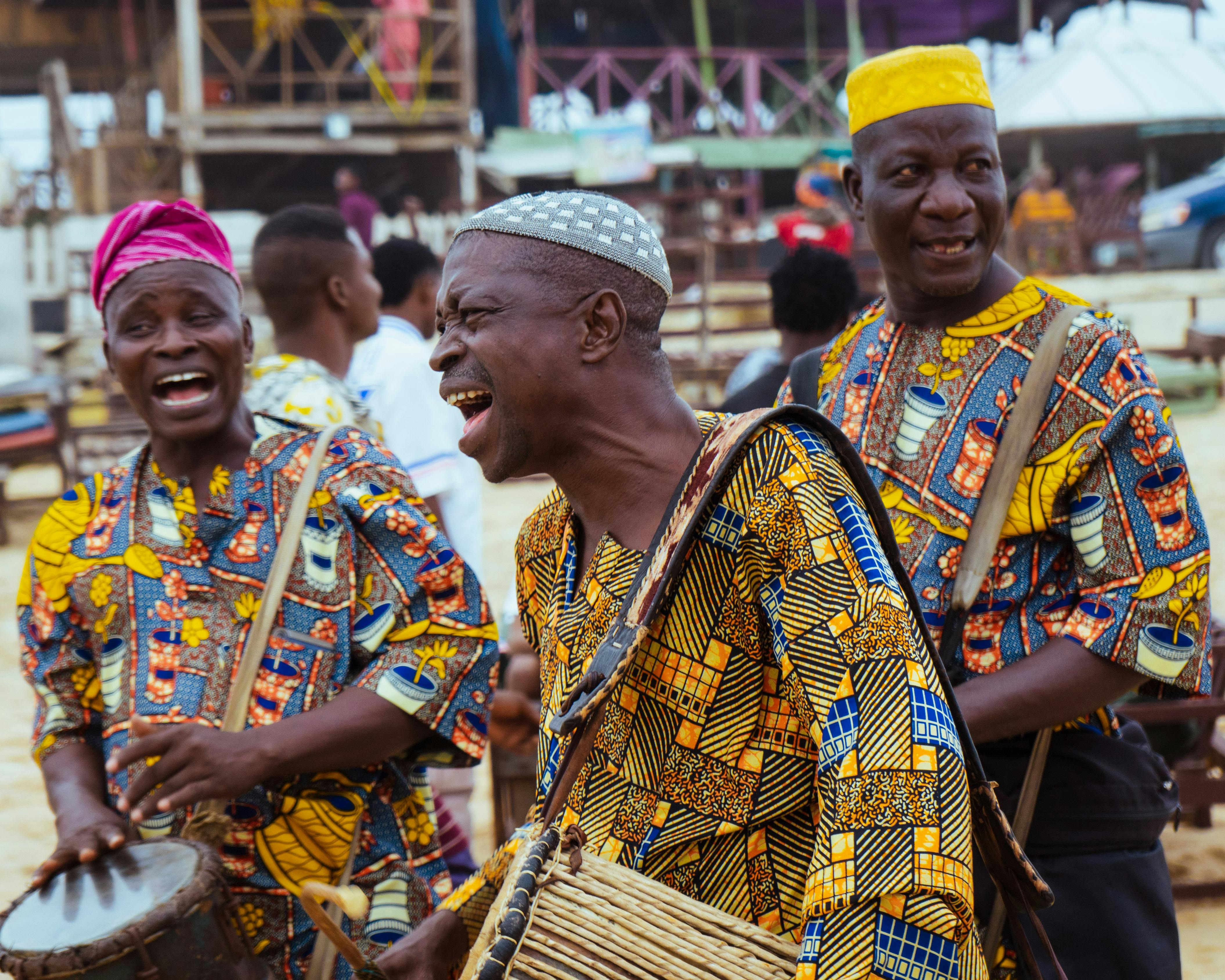 Group of Men Playing Drums