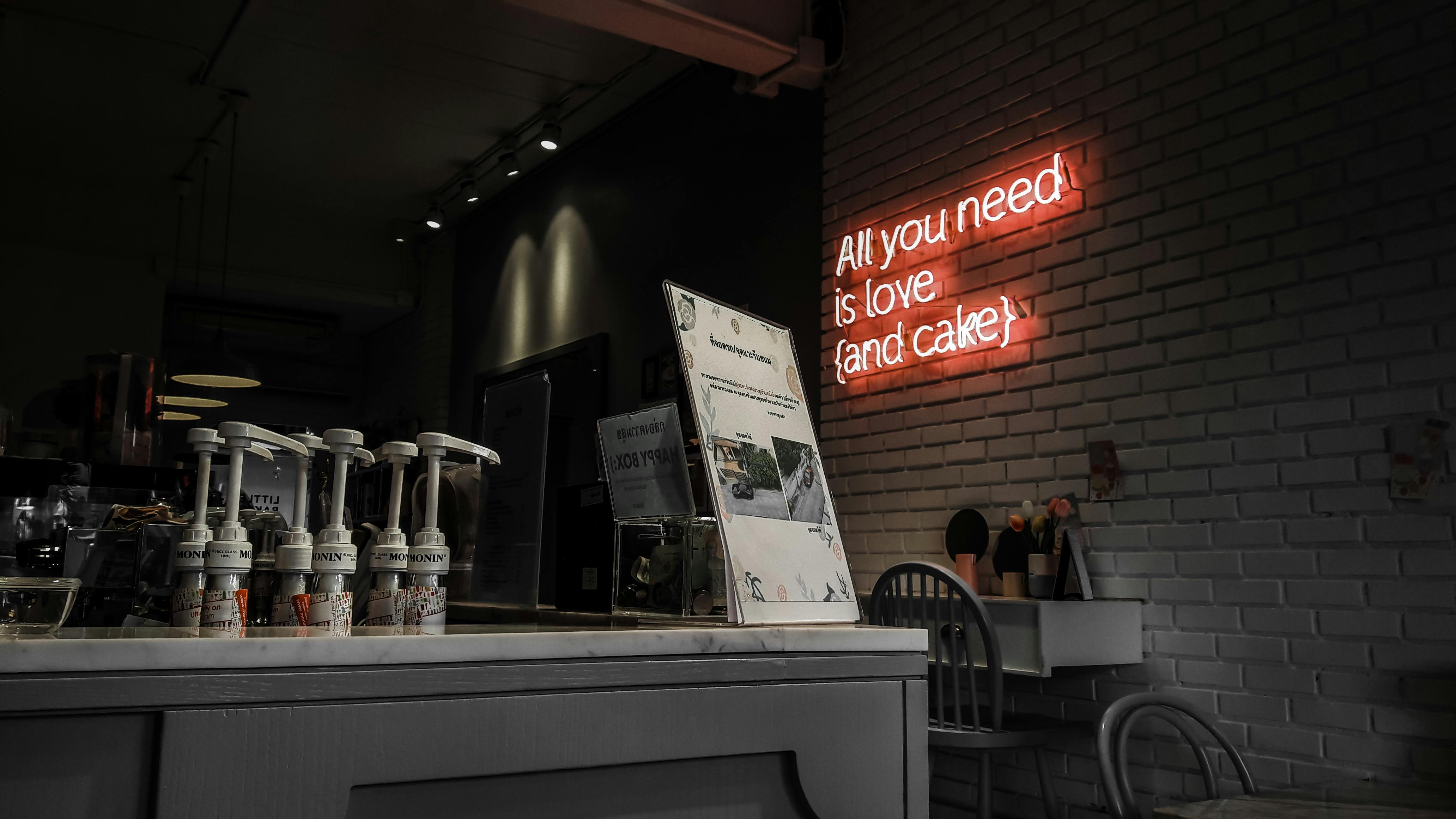 Empty Bar with Illuminated Neon Sign