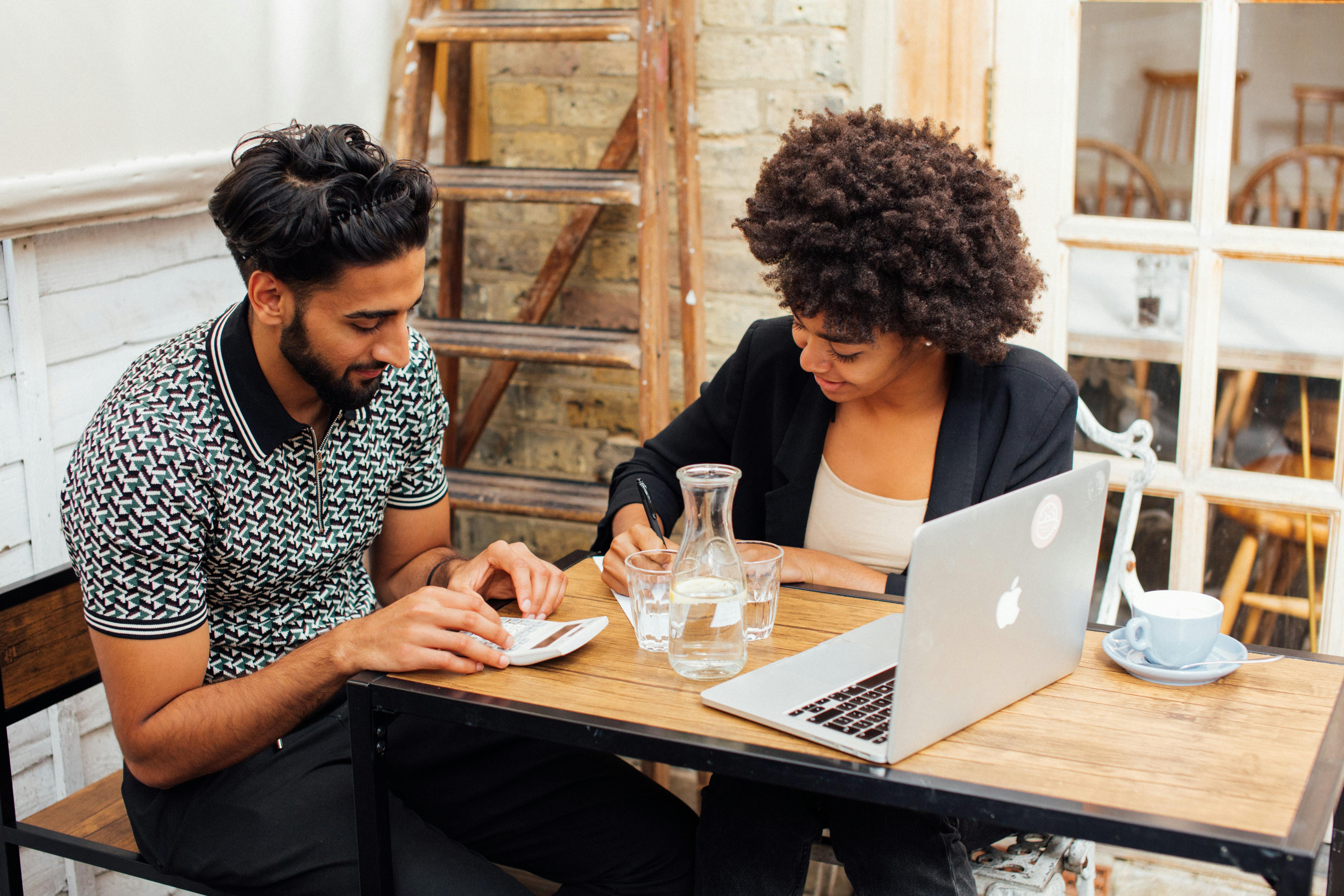 Couple Doing Accounting at Work