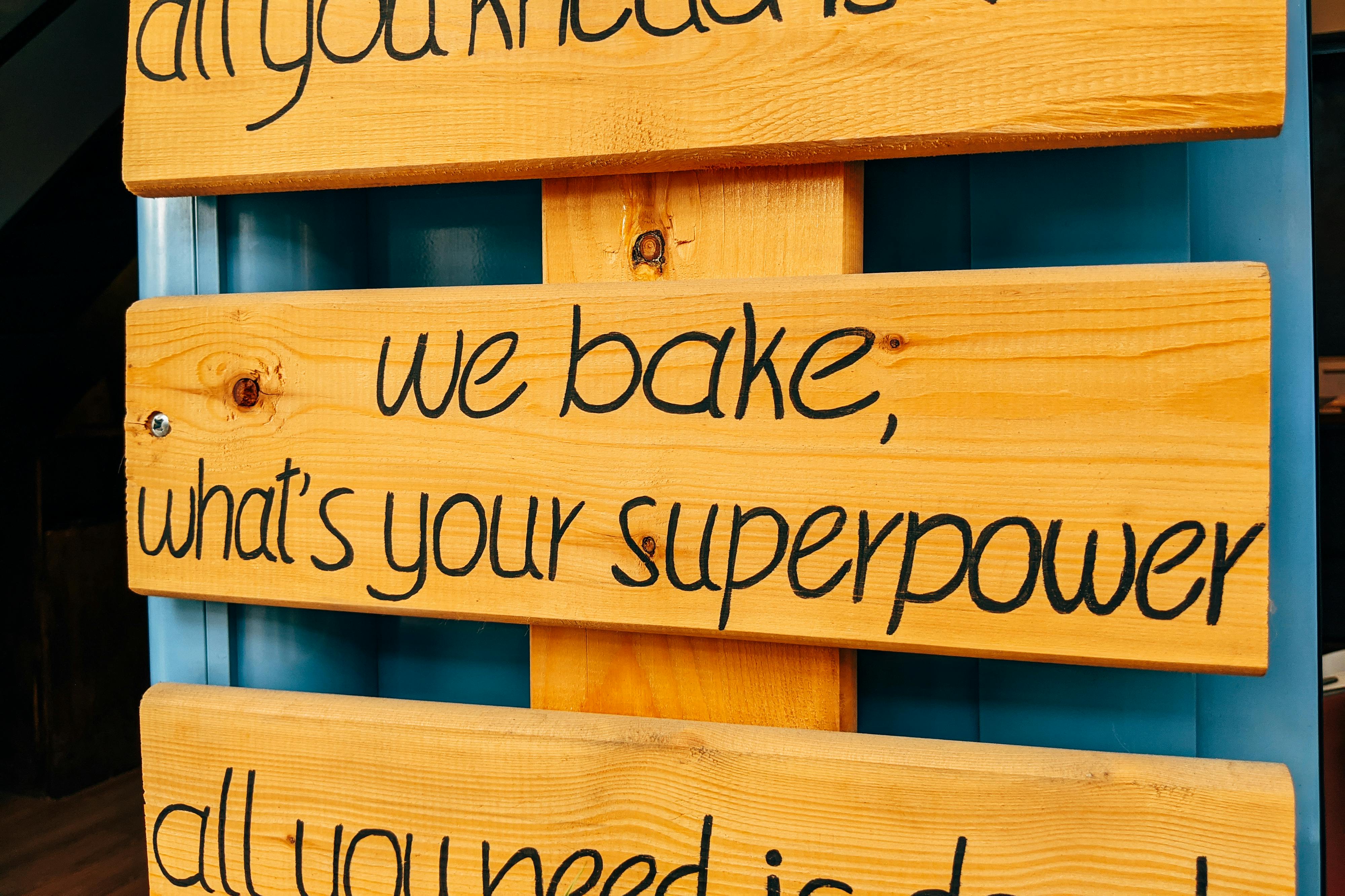 Marketing Text of Bakery on Wooden Sign