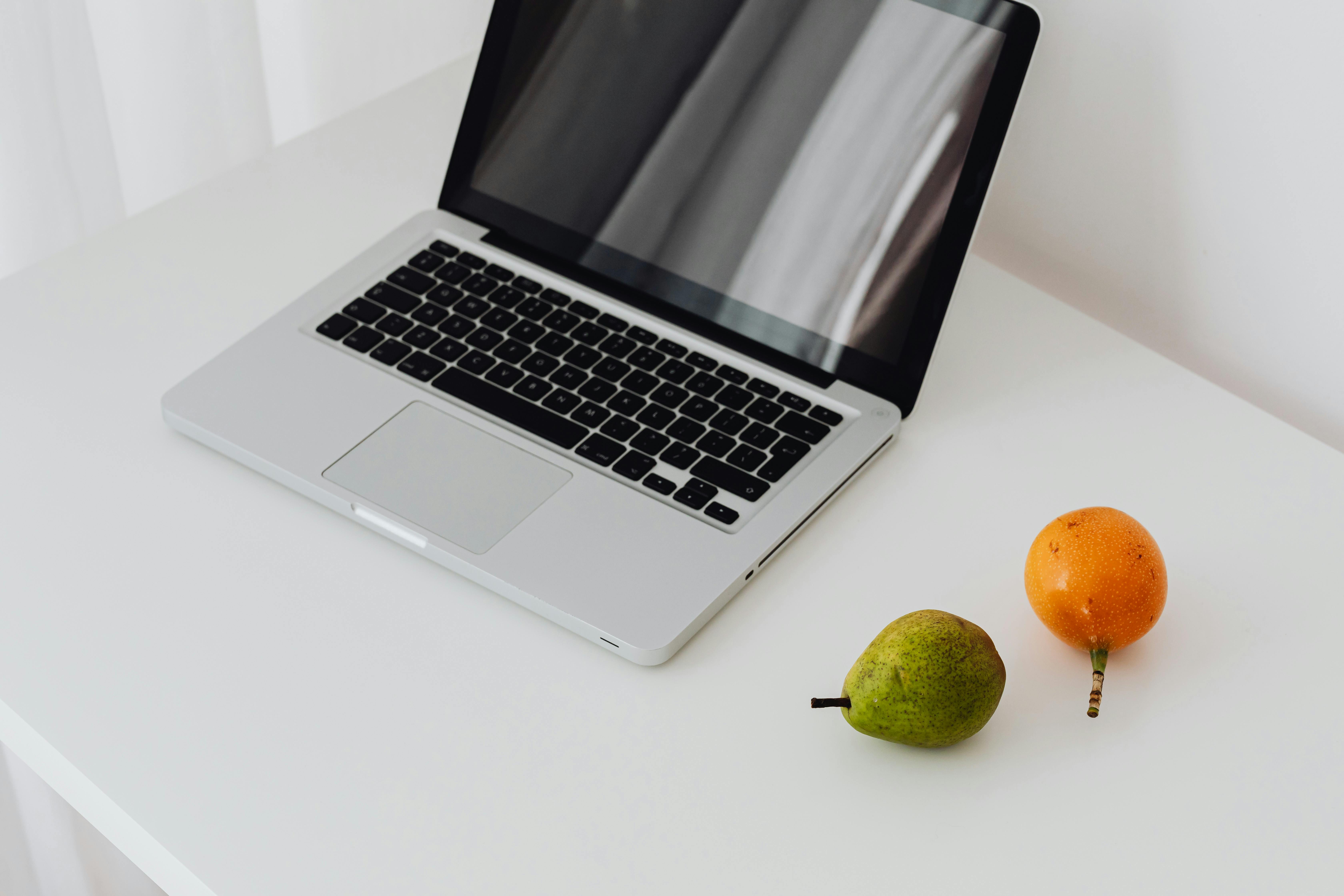 Black and Gray Laptop on the Table