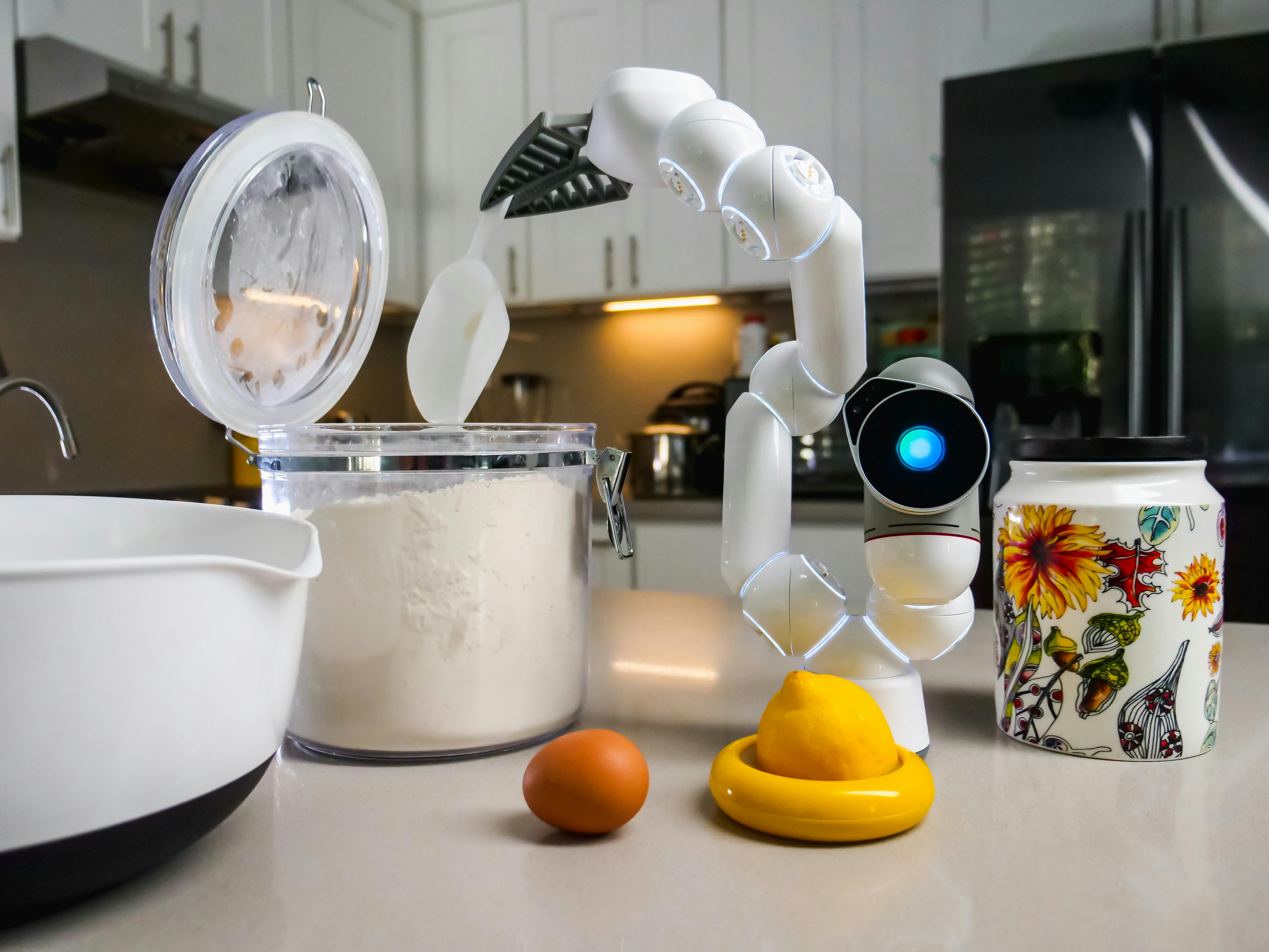 White Toy Robot with a Scoop
