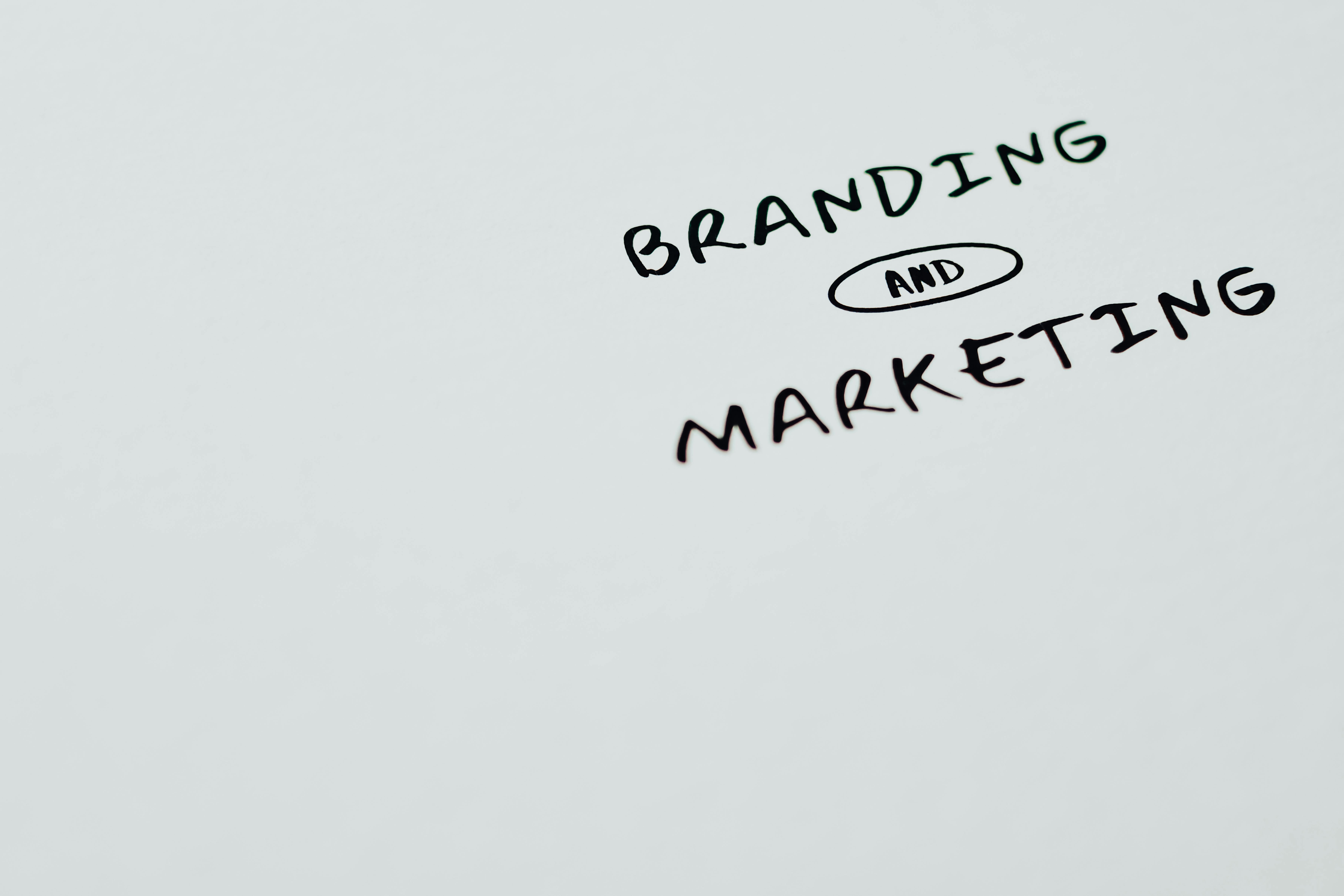 Branding and Marketing Text on a White Surface