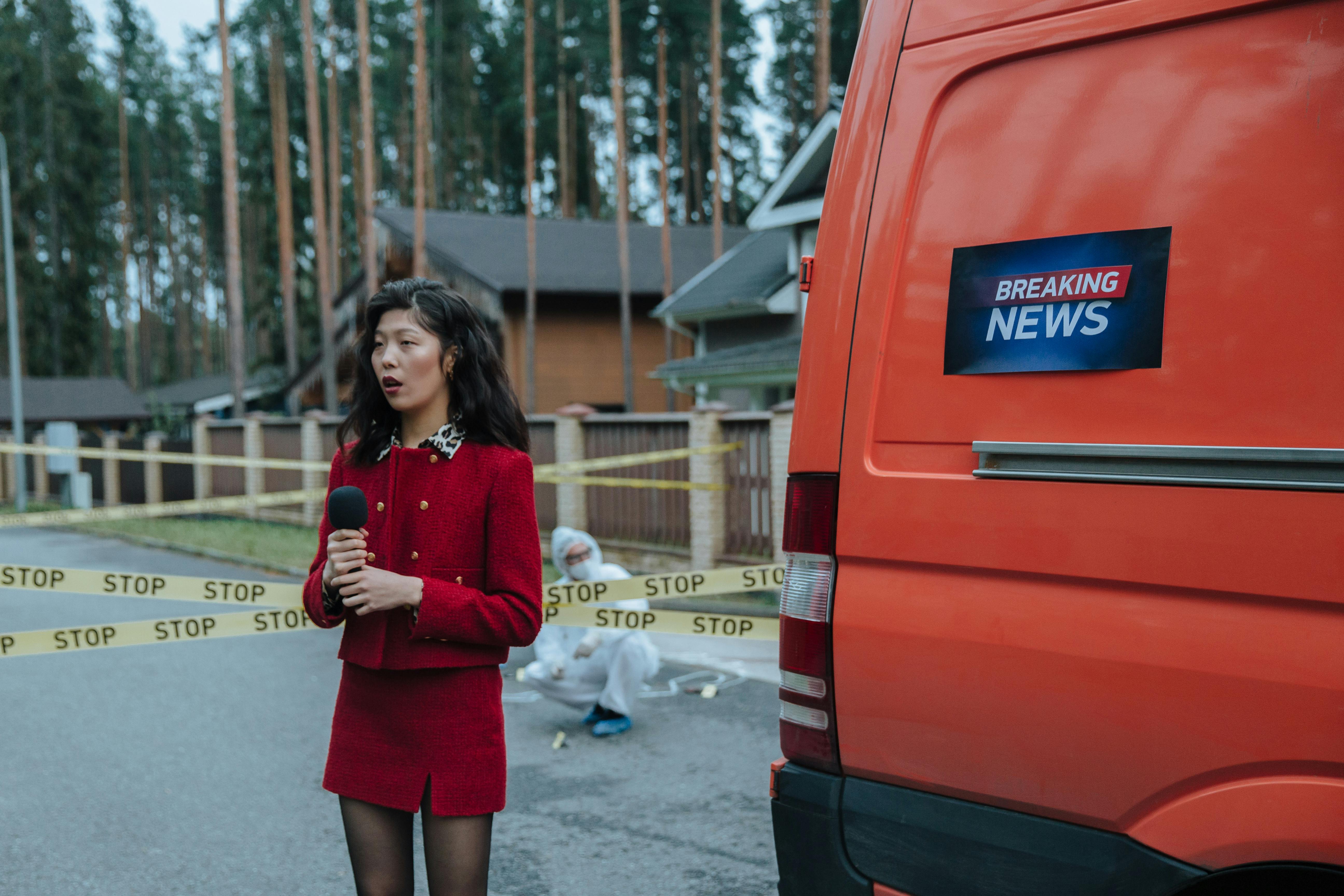 A Reporter Standing Near the Crime Scene