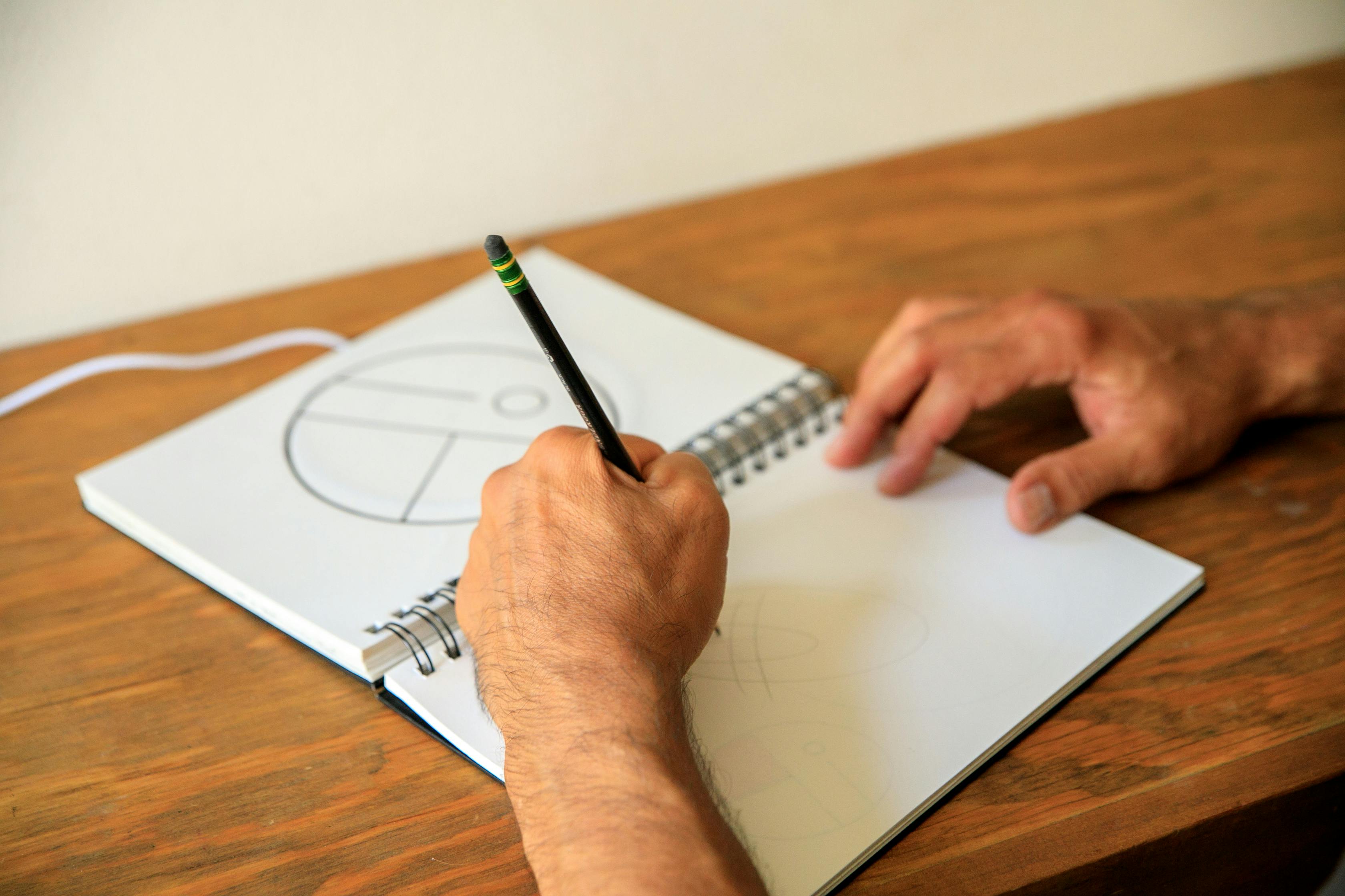 Close up of Spiral Notebook with Drawings