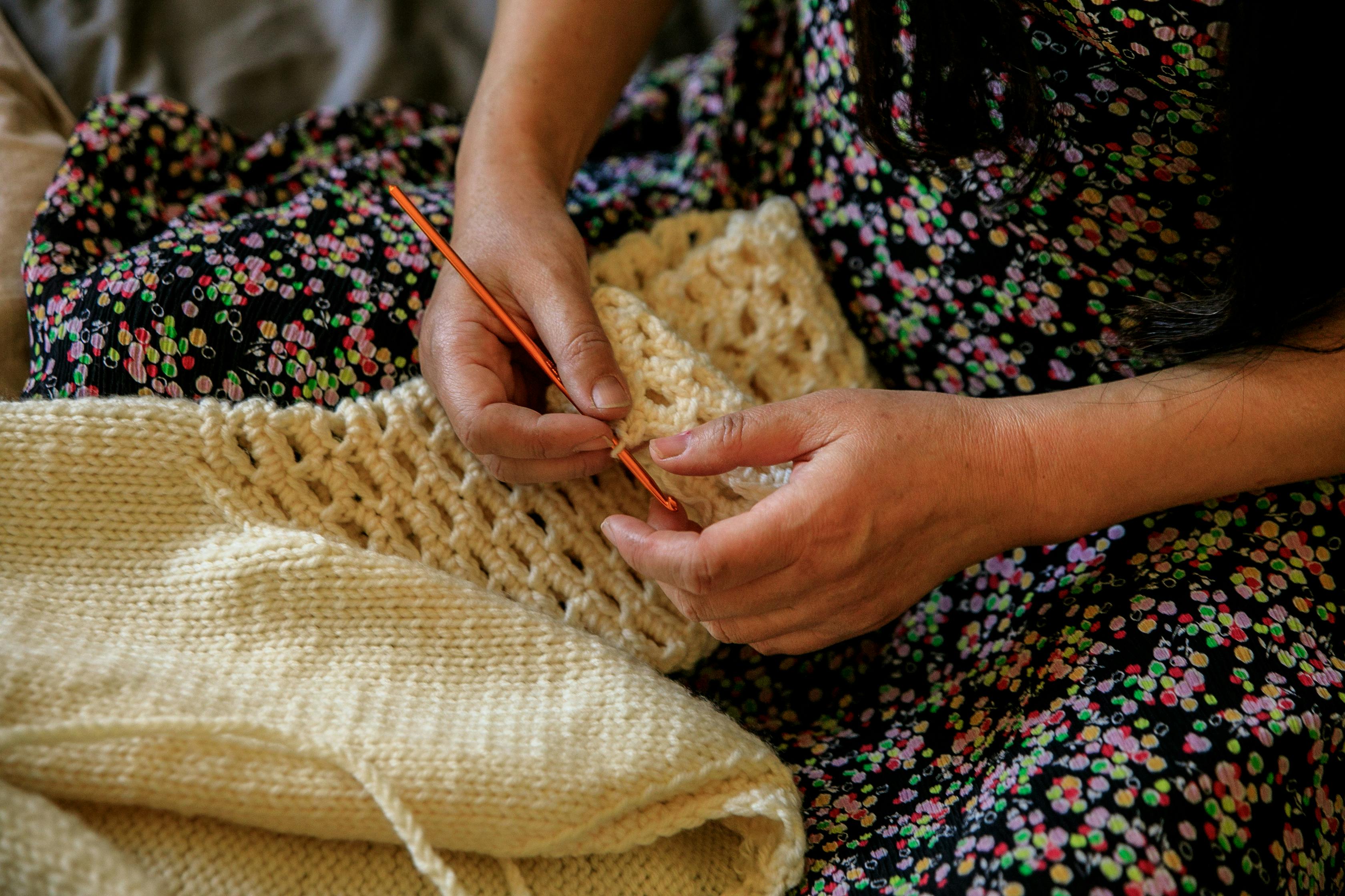 Close-up View of Woman Crocheting