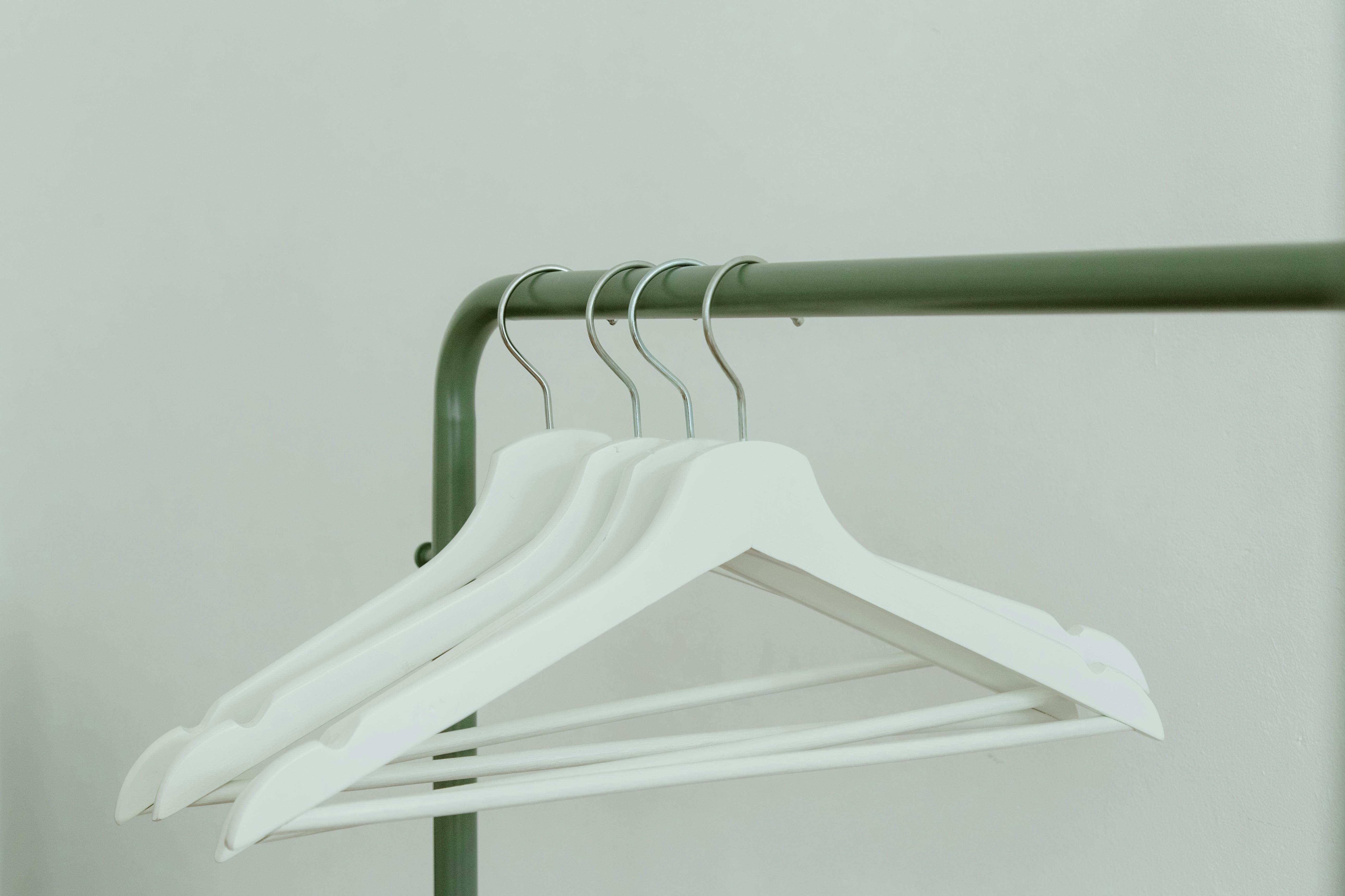 White Hangers on Clothing Rack