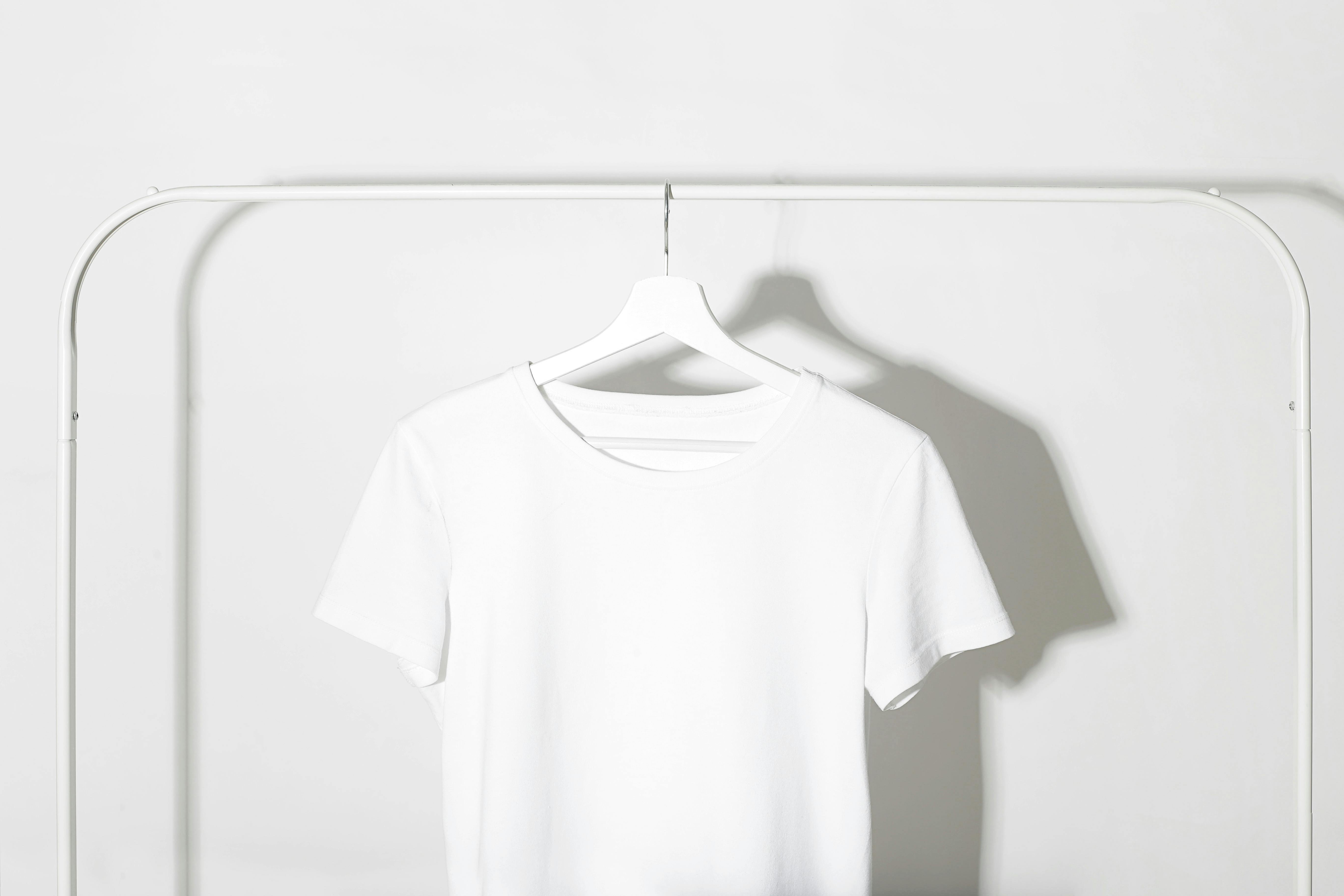 White T-Shirt hanging on a Rack