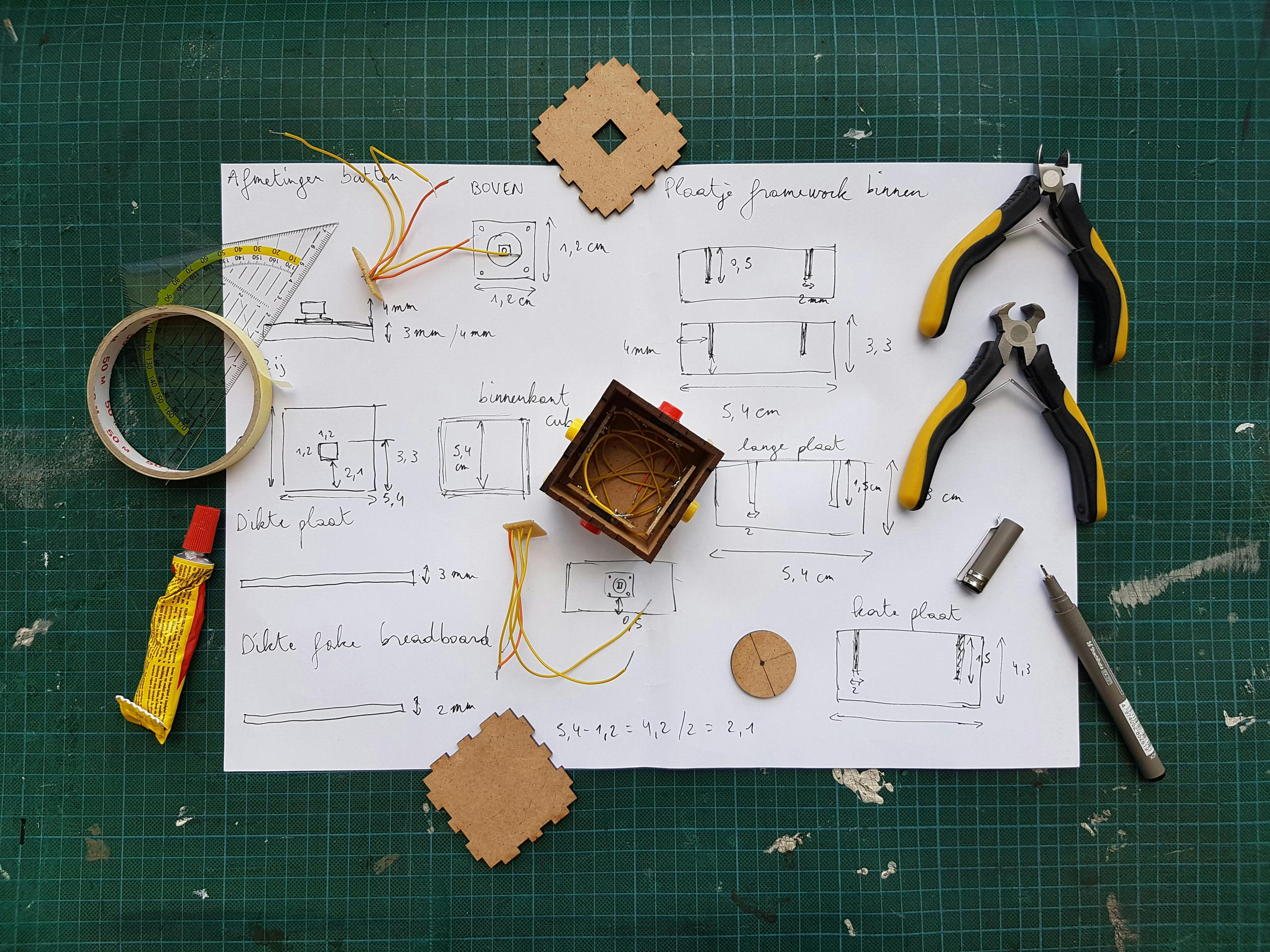 White Diagram Paper Under Pliers