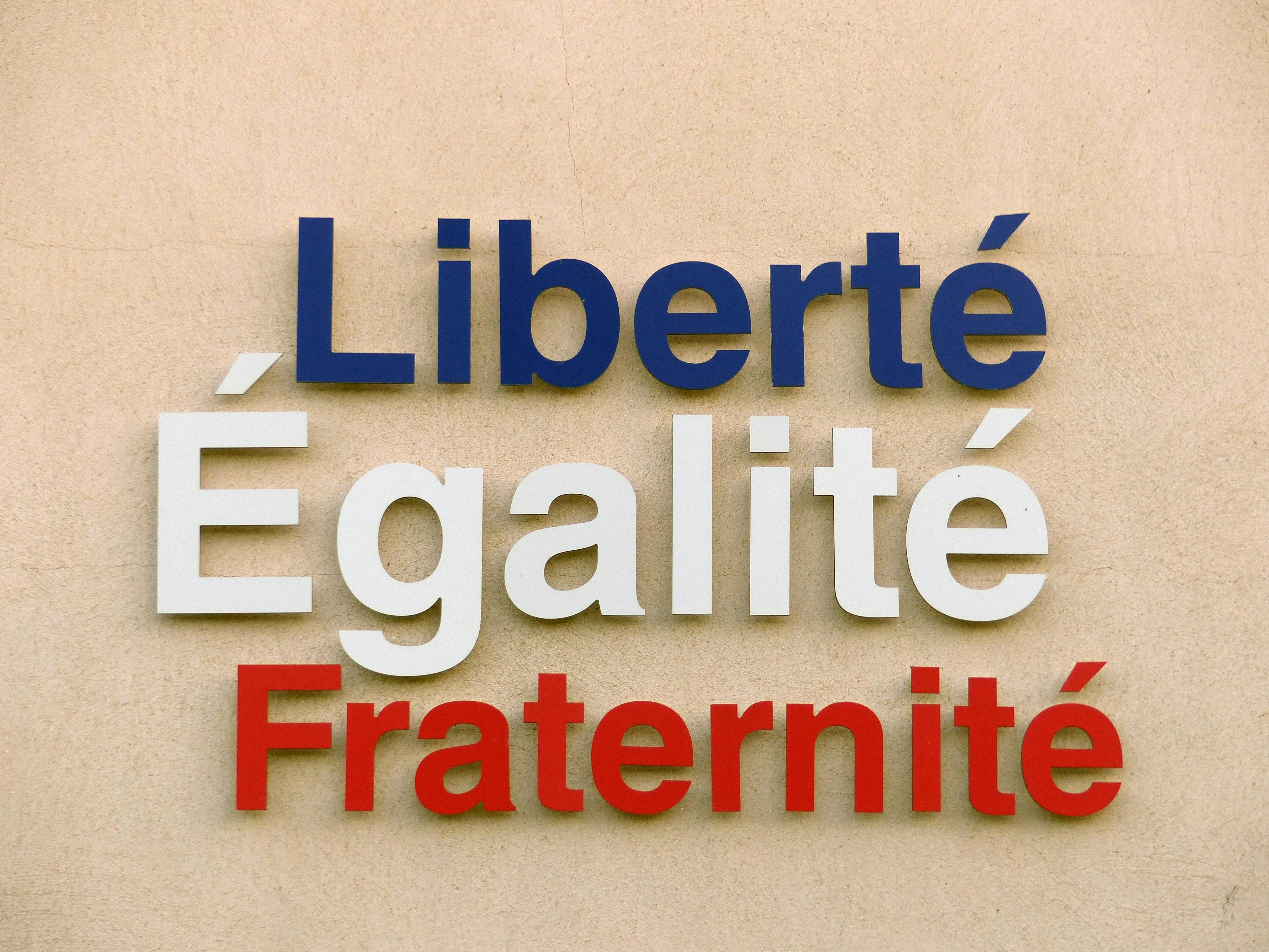 Liberty, Equality and Fraternity Script on a Wall