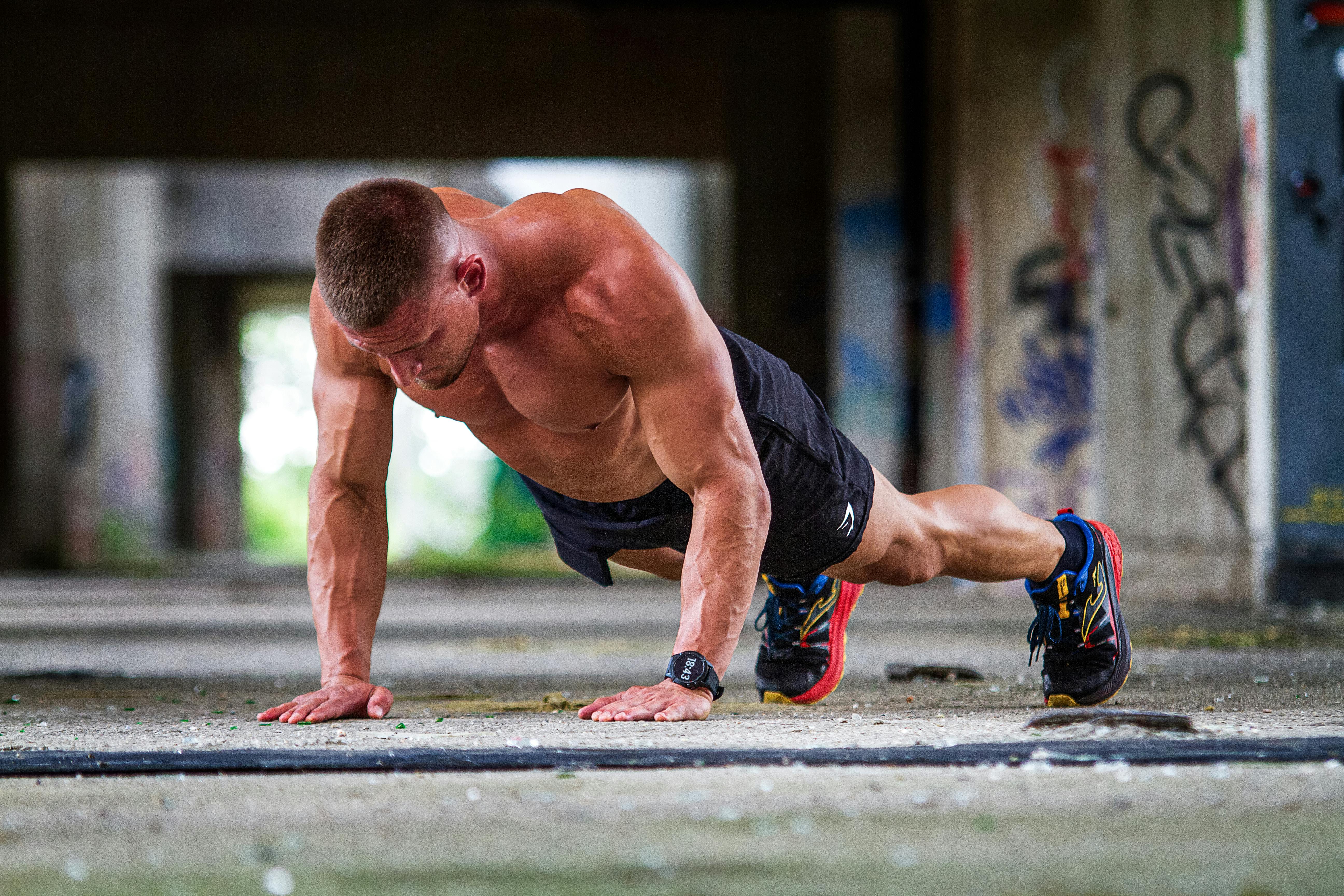 Shirtless Muscular Man Doing Push-ups