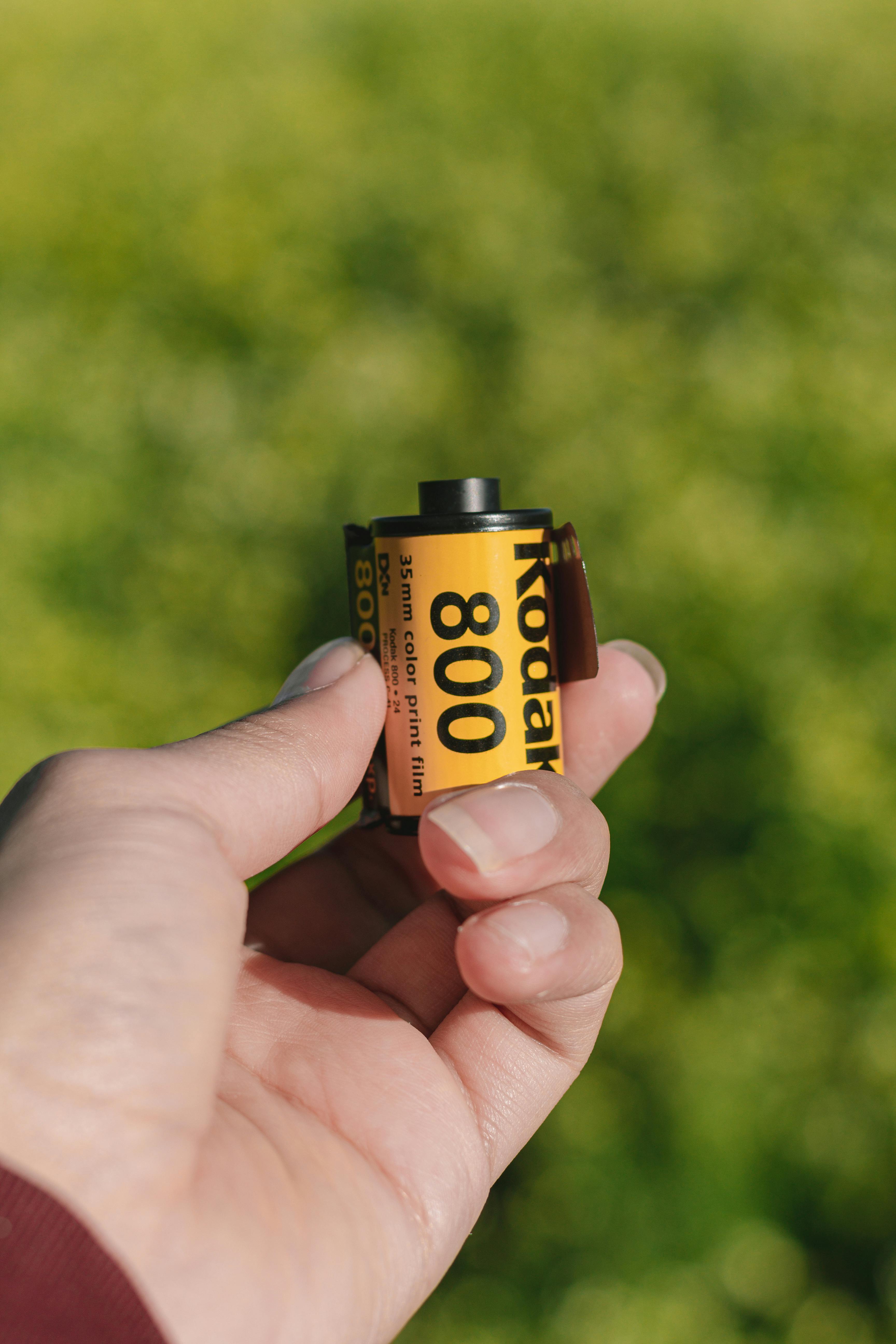 Hand Holding a Kodak Film Roll 