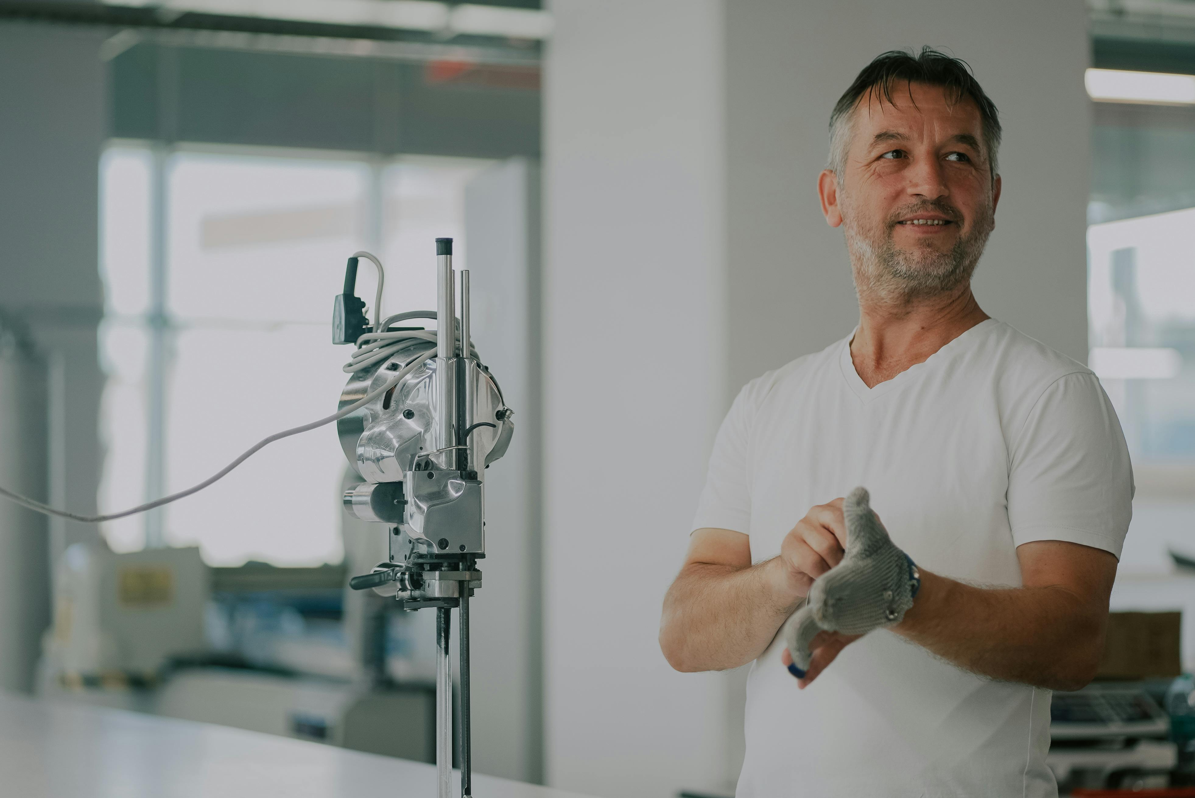 Man Working with Textile Machinery