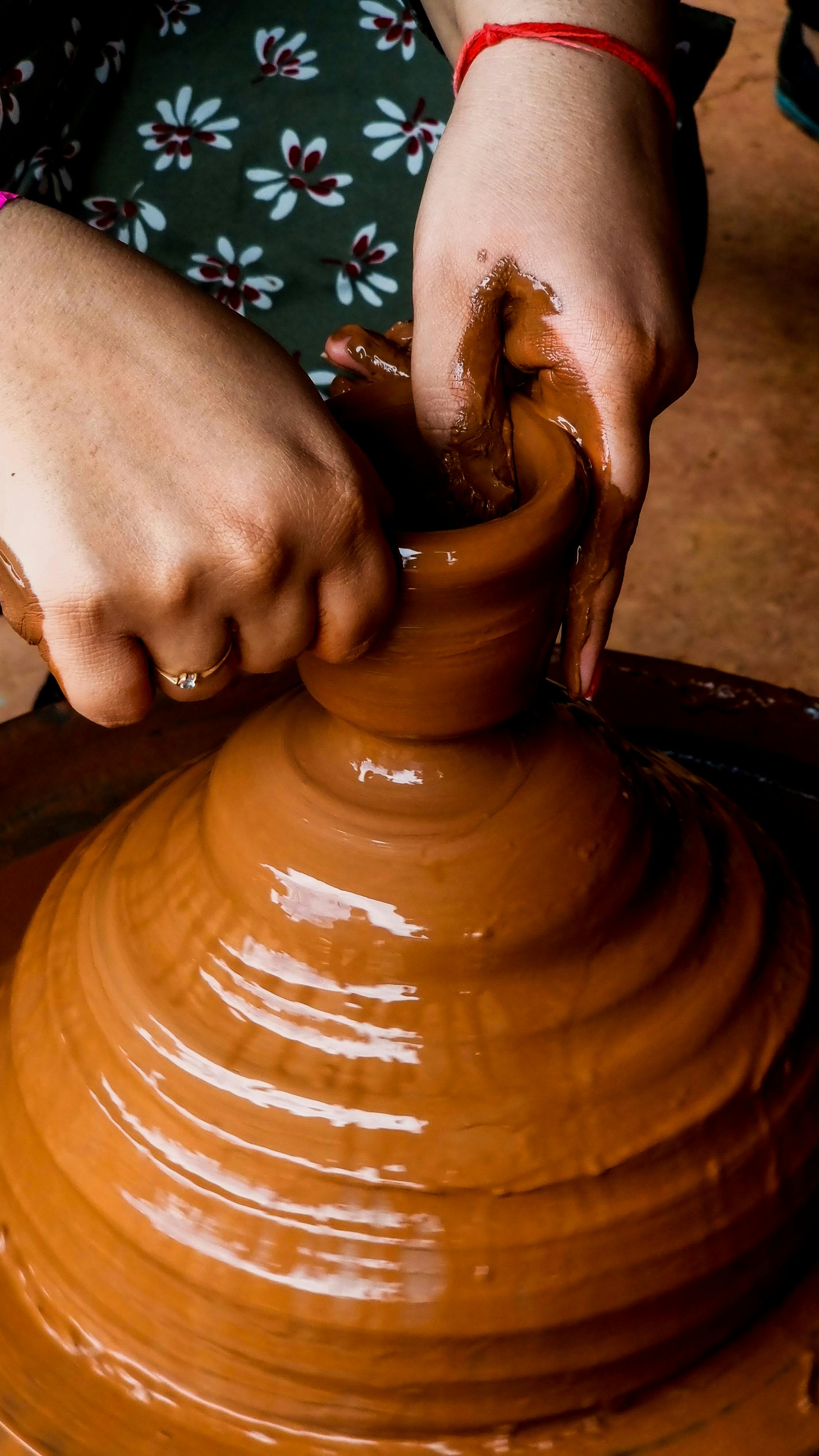 A Close-Up Shot of a Person Doing Pottery