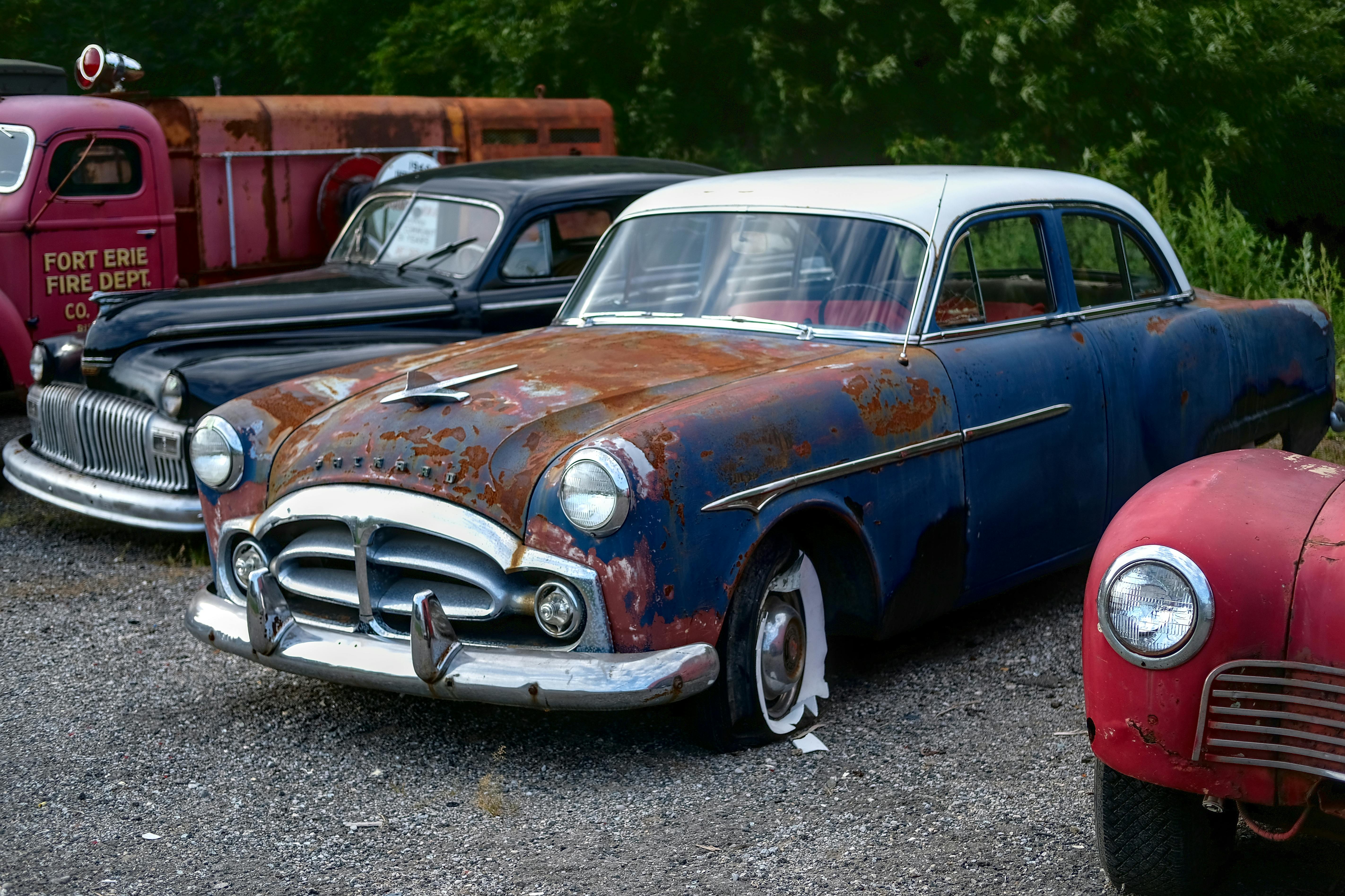 Parked Old Rusty Classic Cars