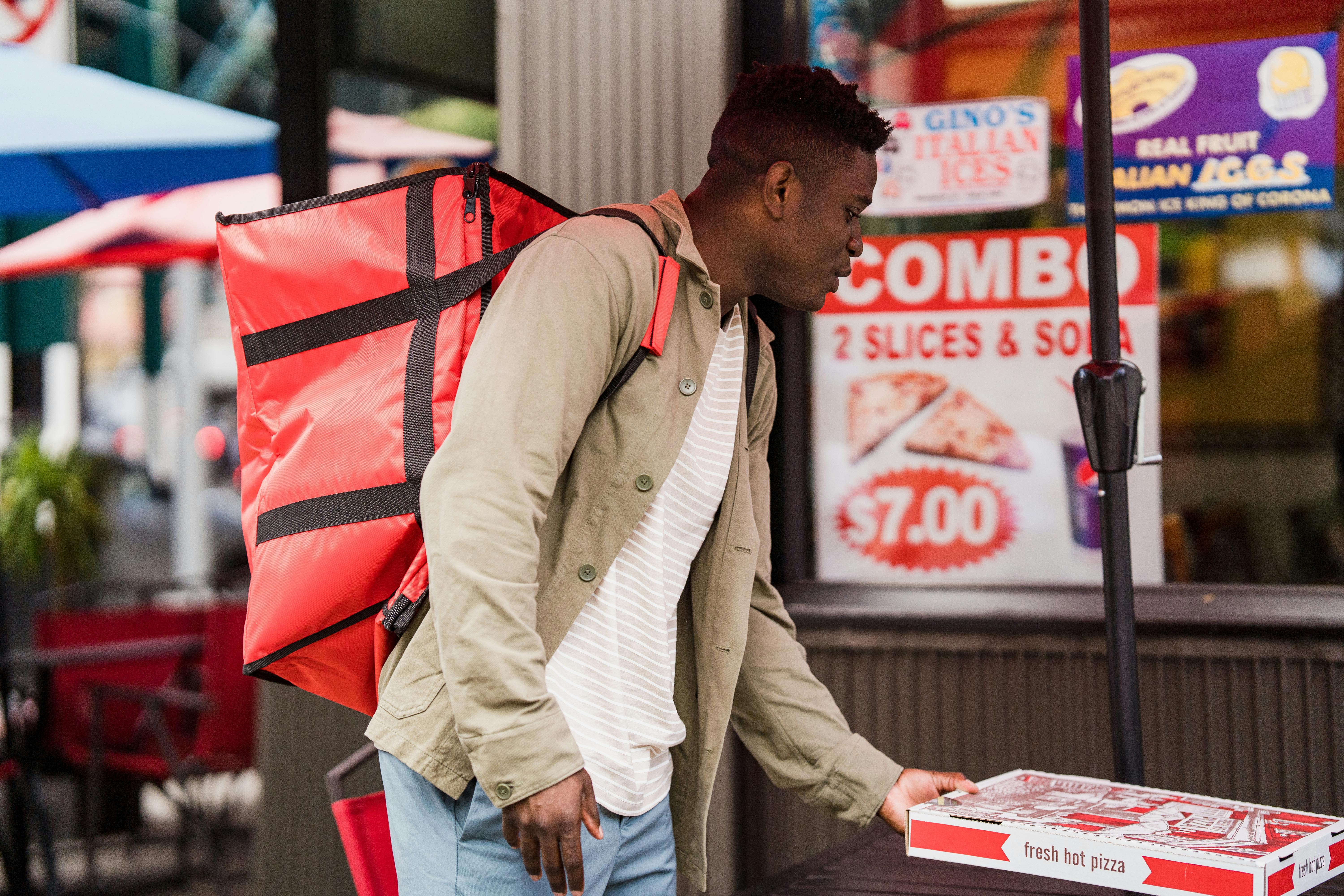 Delivery Man with Pizza
