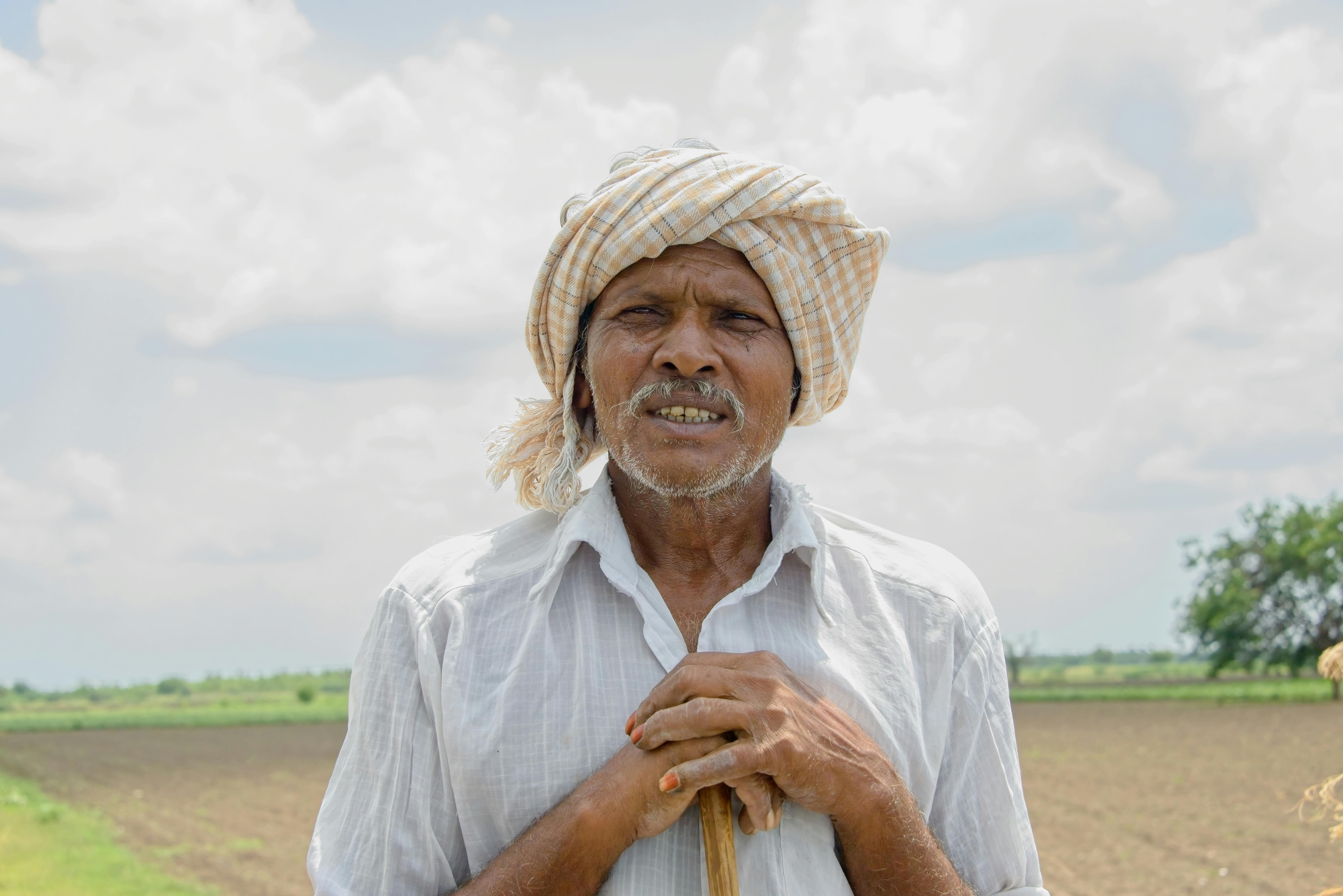 Portrait of a Man Standing in a Field