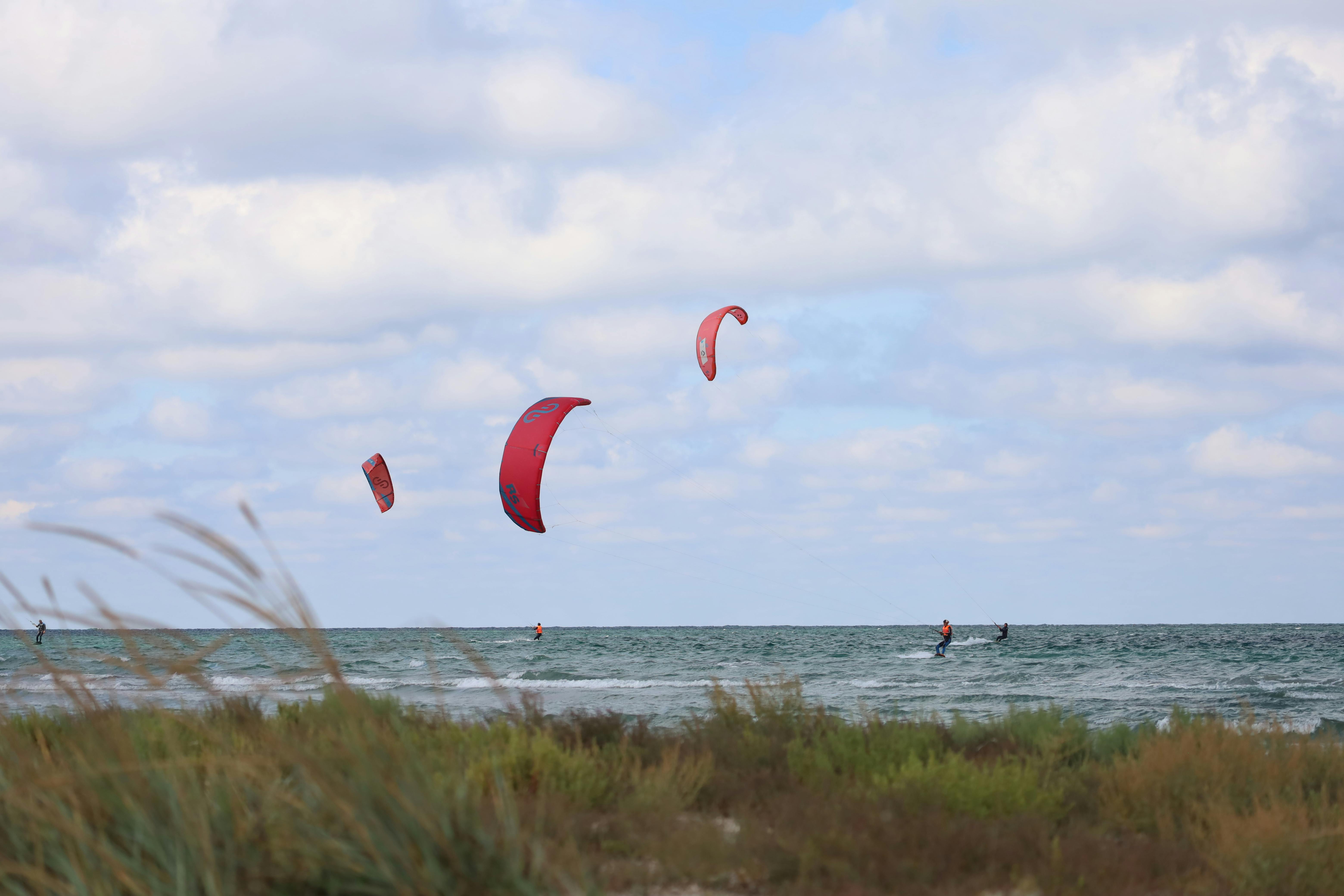 People Parasailing in Ocean