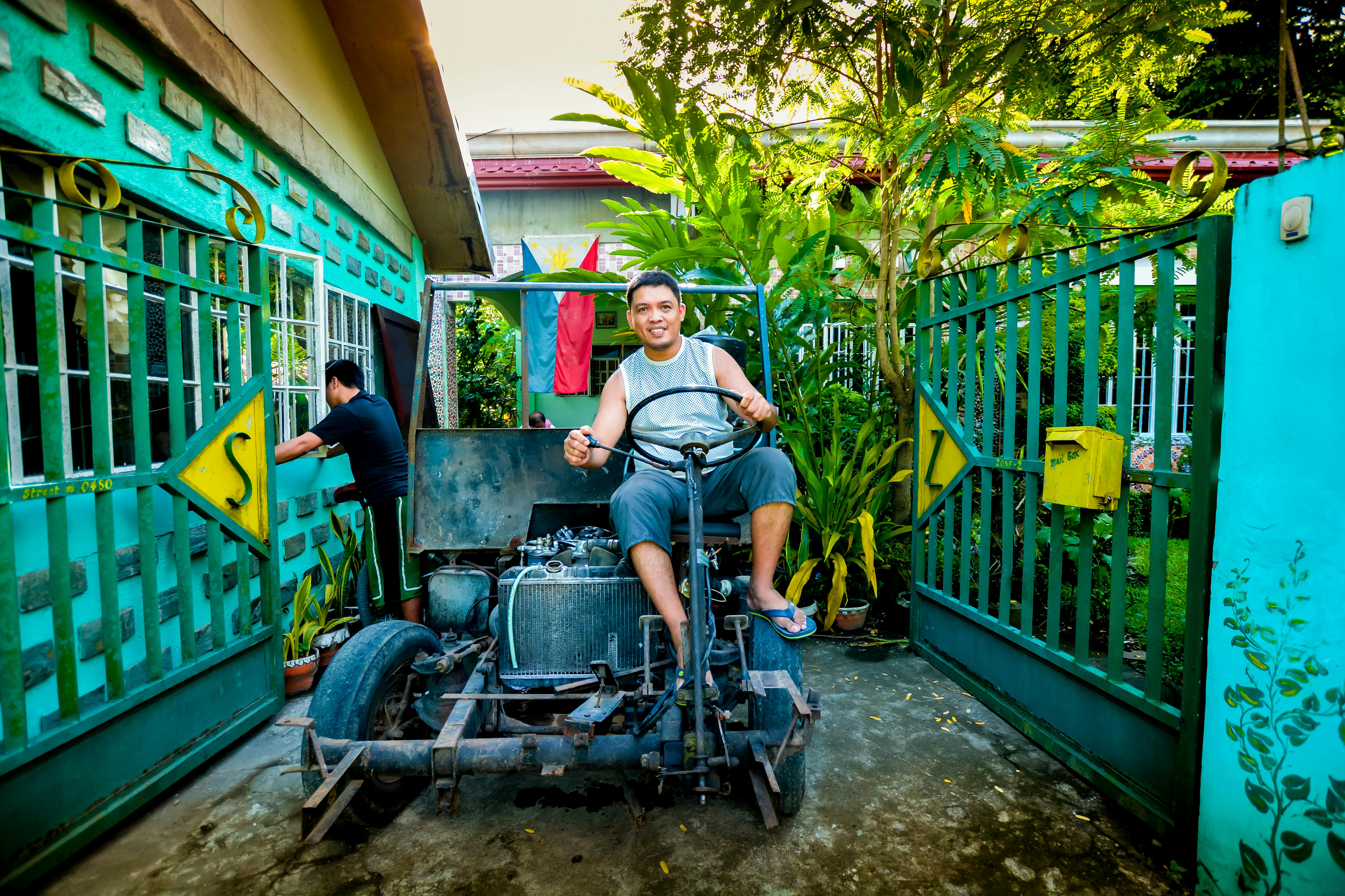 A Man Riding a Customized Motor Vehicle