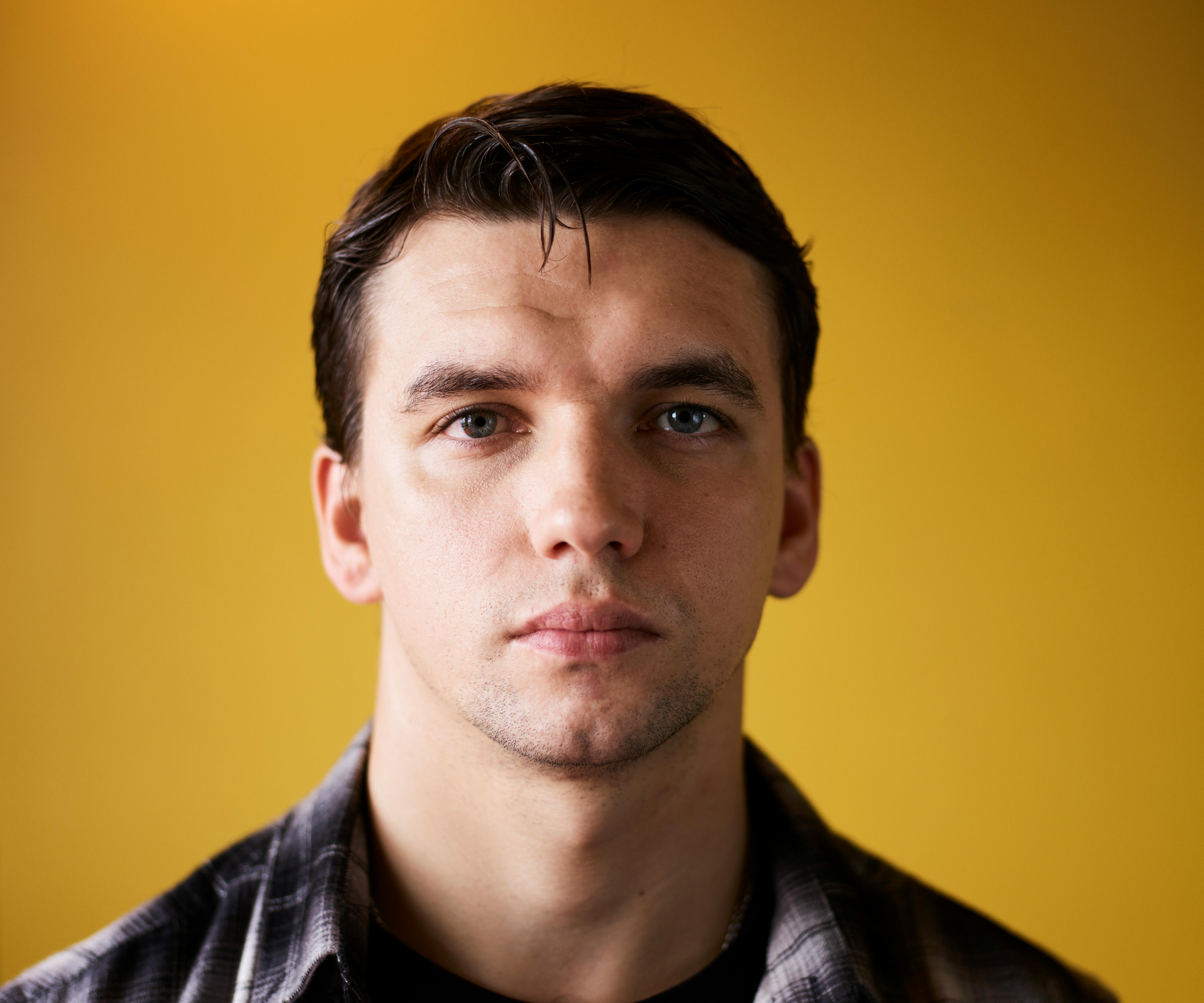 Portrait of a Man on a Yellow Background