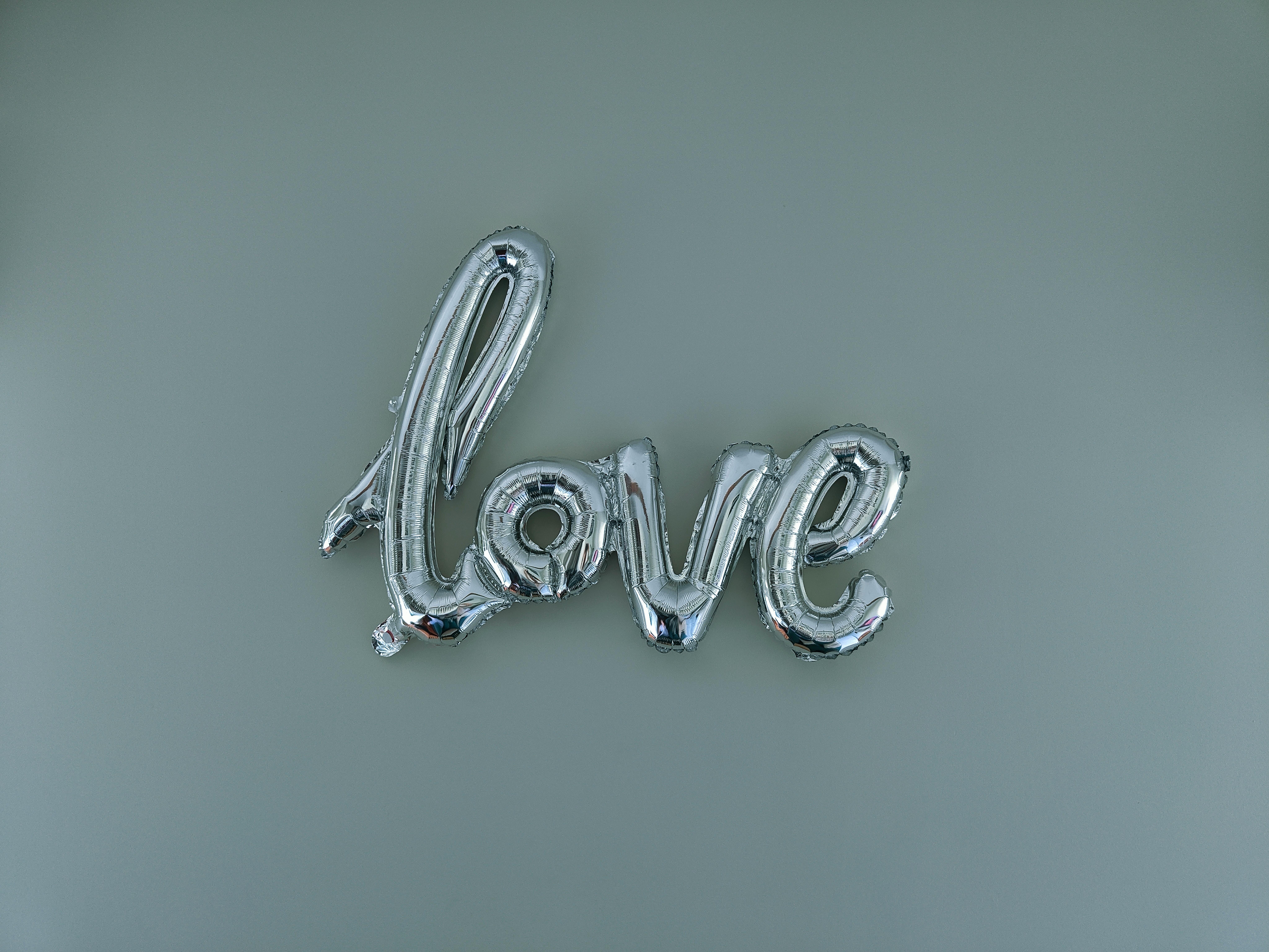 Love Script Made of a Silver Foil