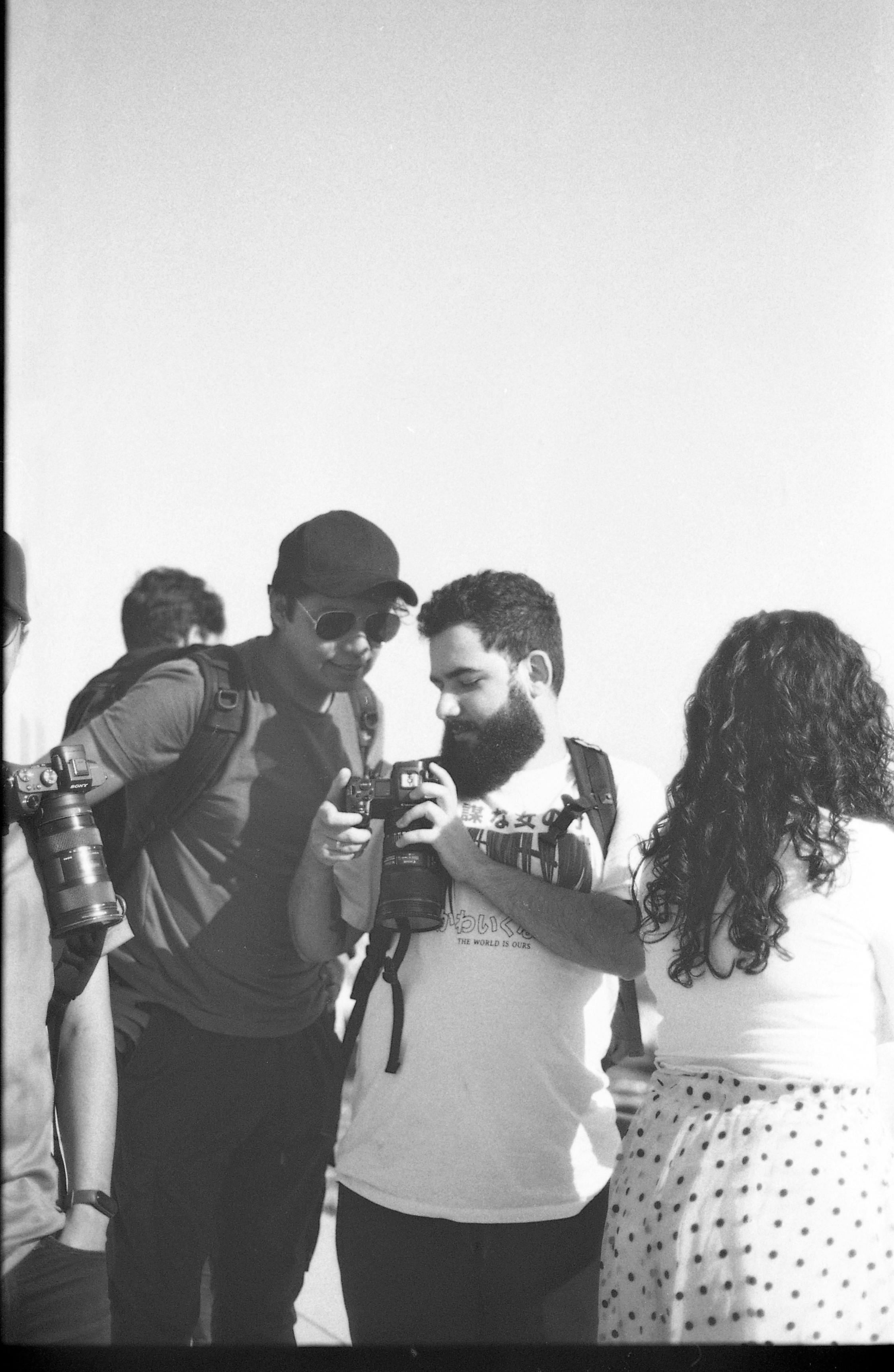 Man Showing Camera Screen