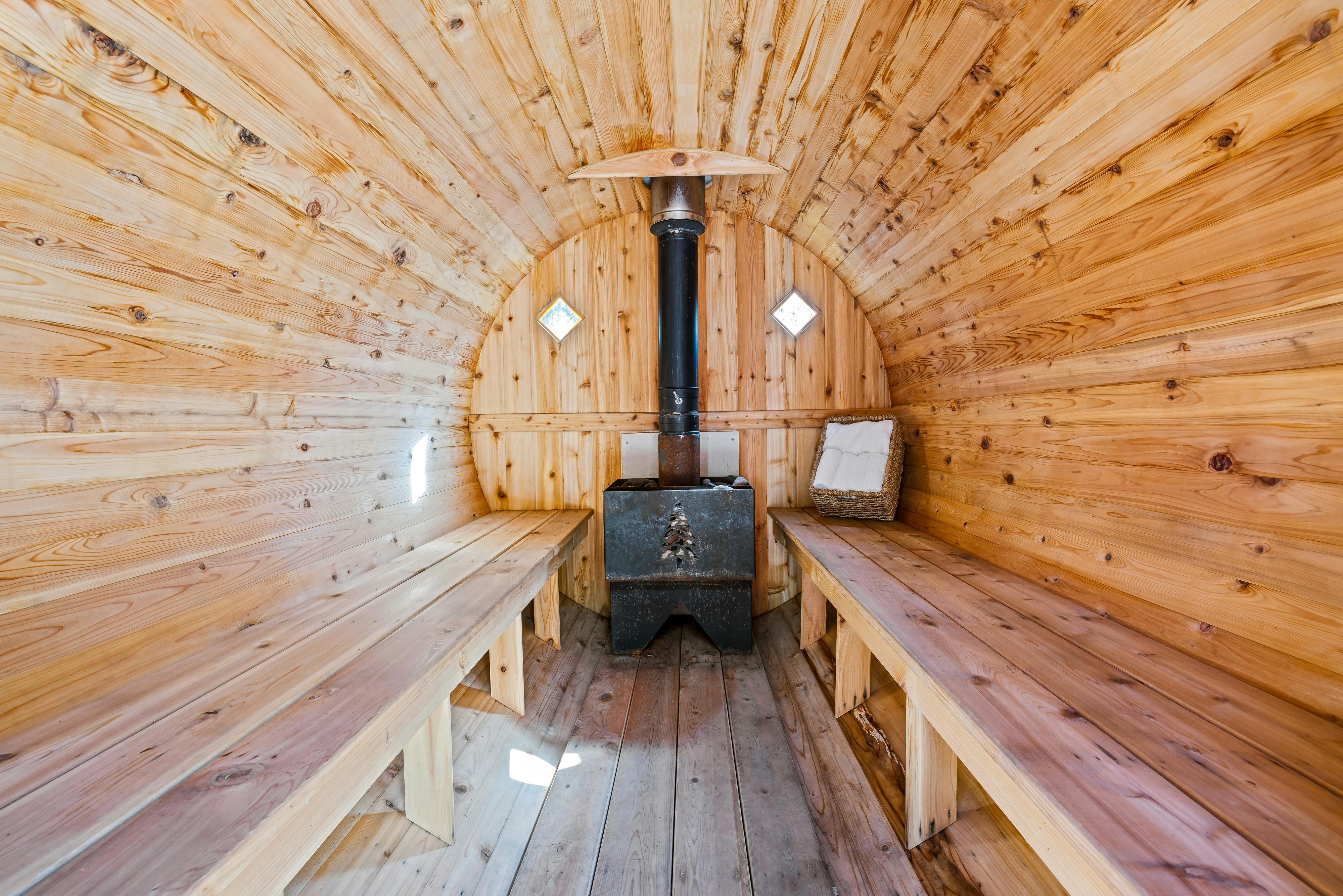 Stove and Benches in Sauna