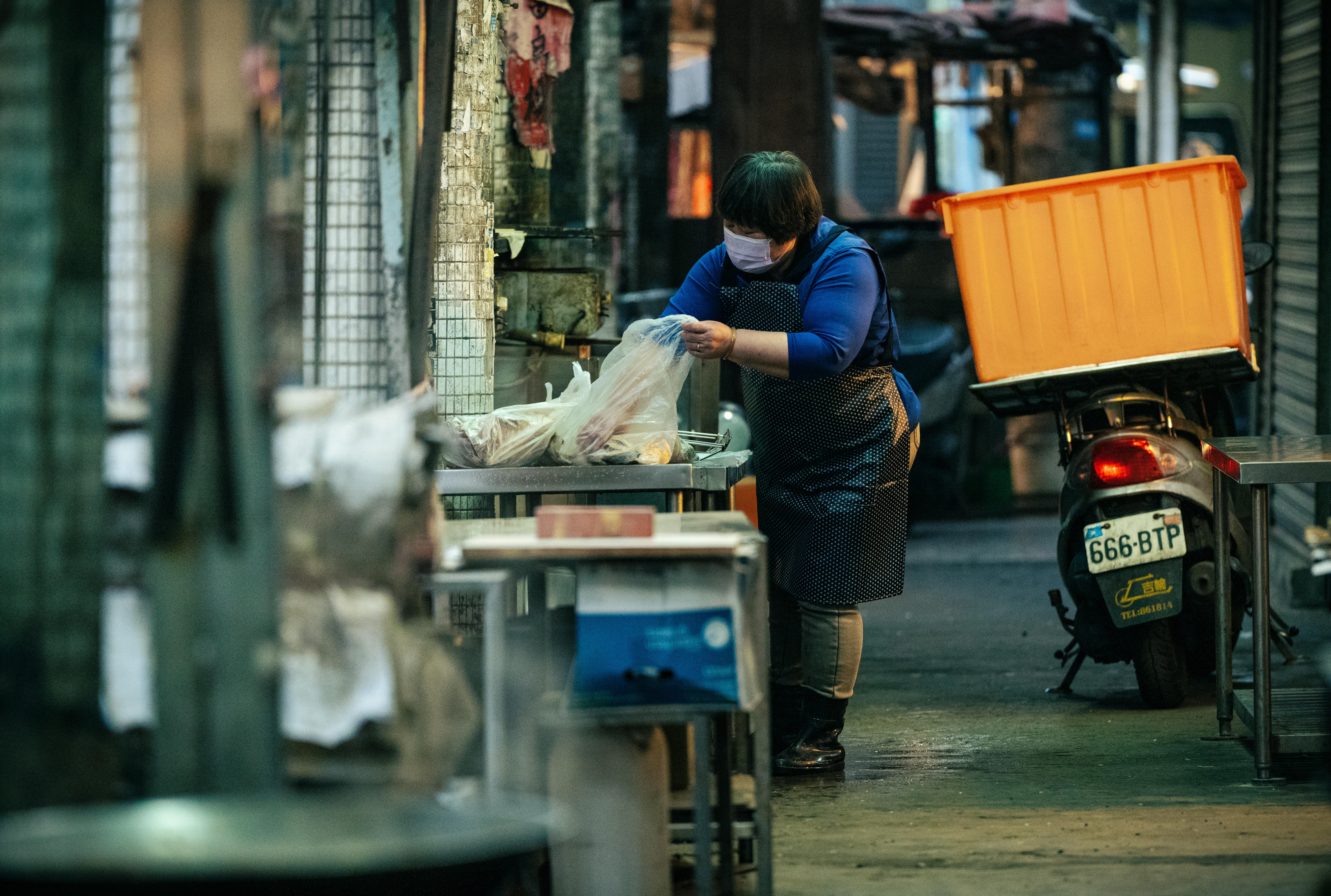 Person Packaging Meat for Delivery