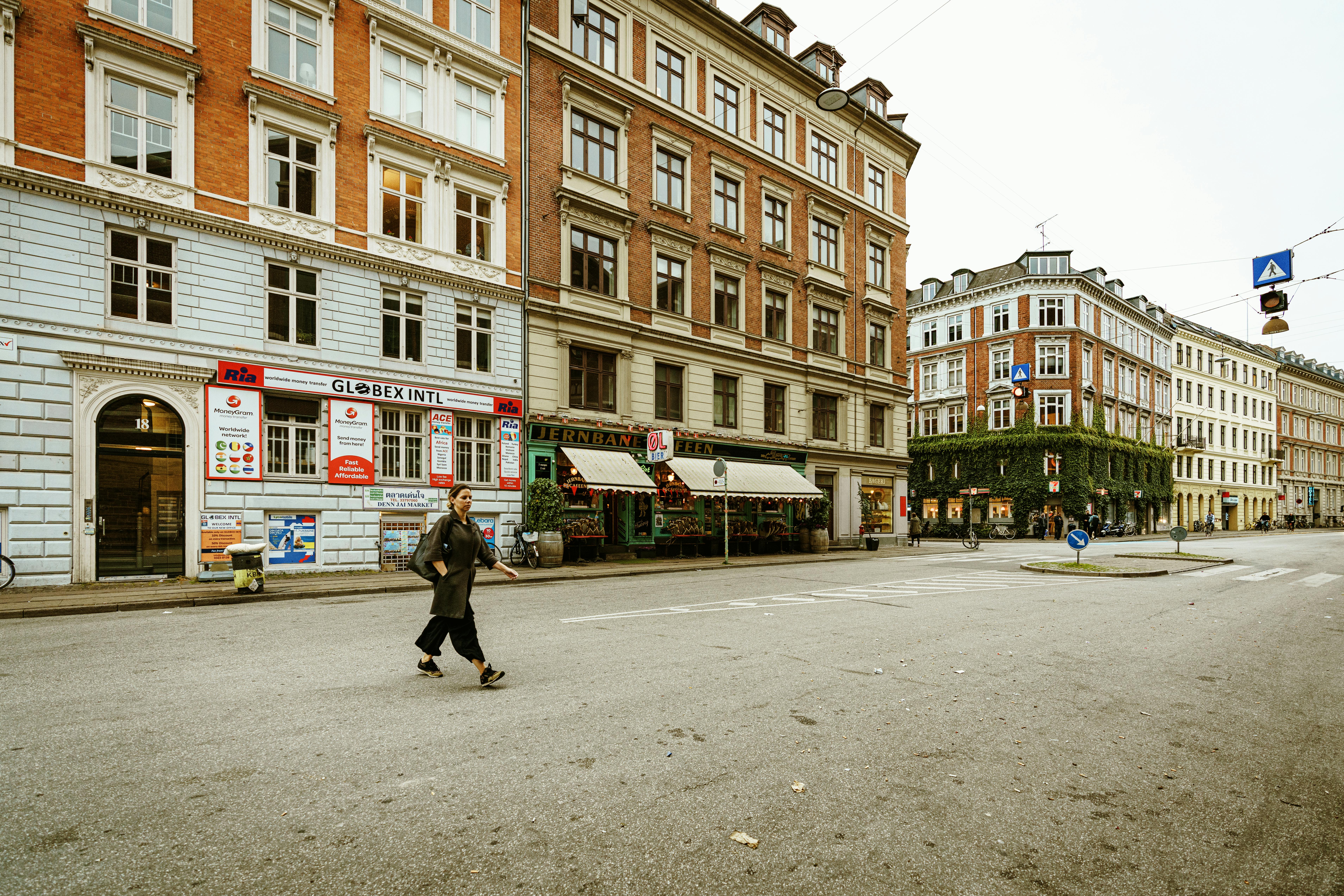 A Woman Crossing a Street