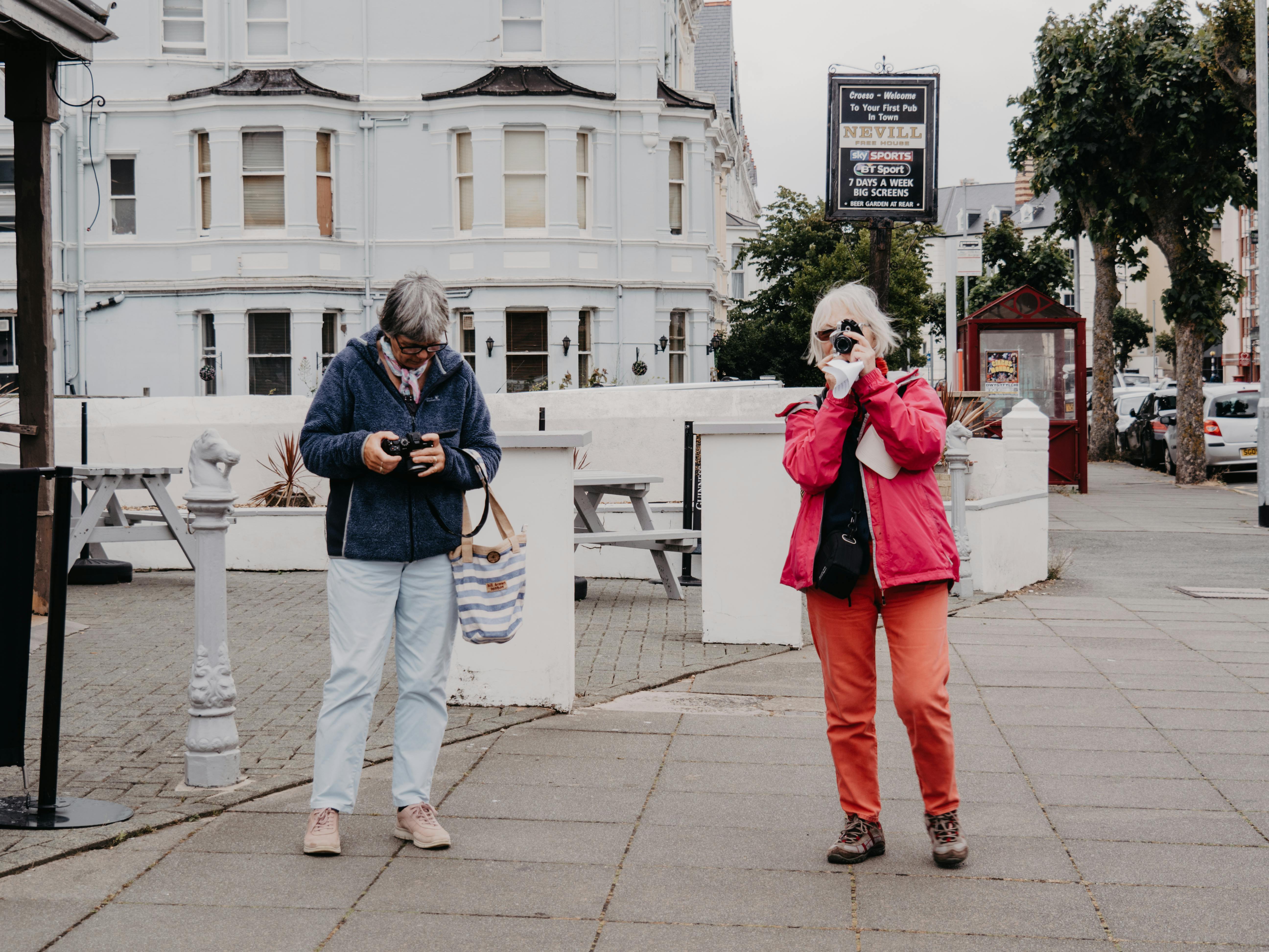 Elderly Couple with Cameras