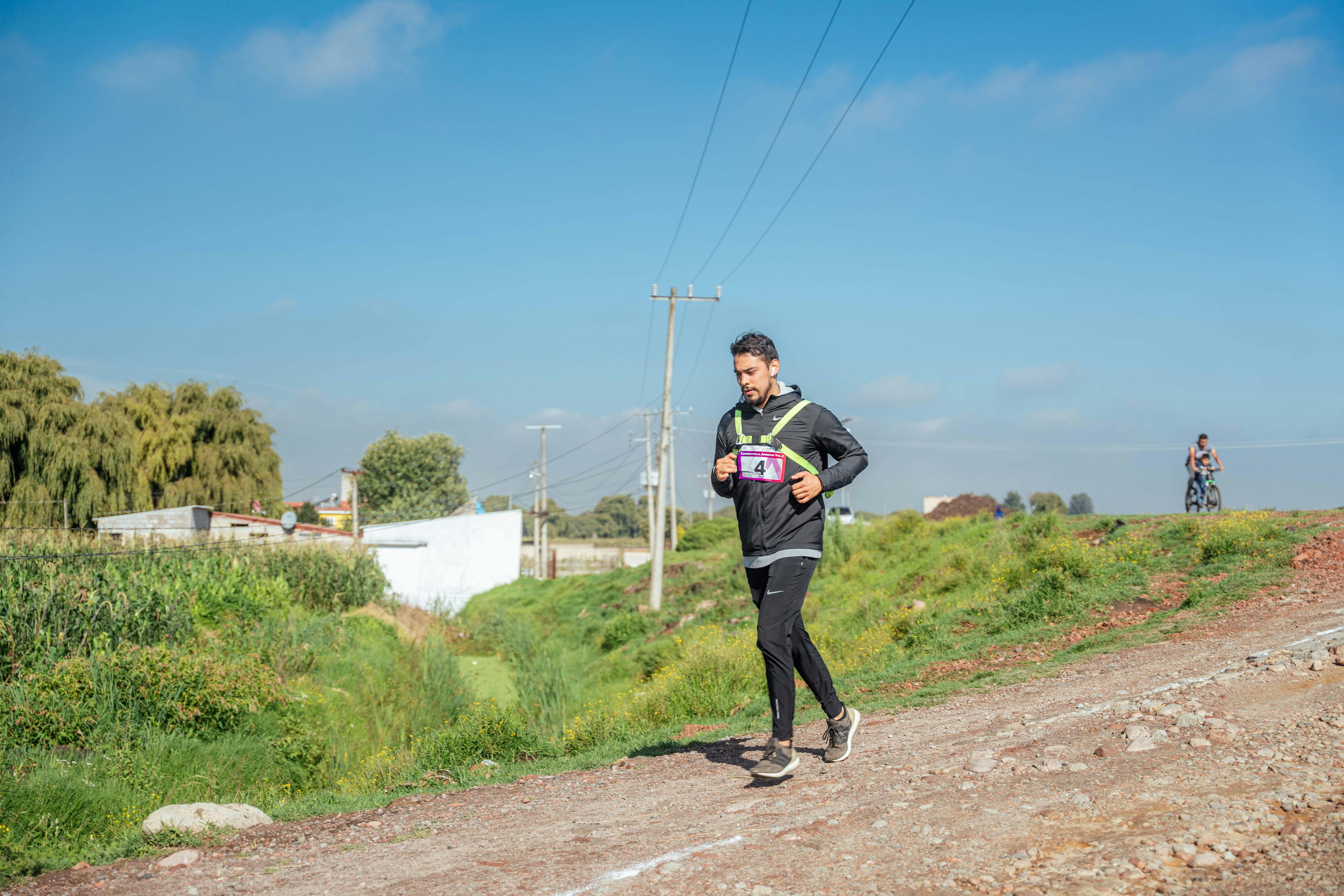 Runner on Dirt Road