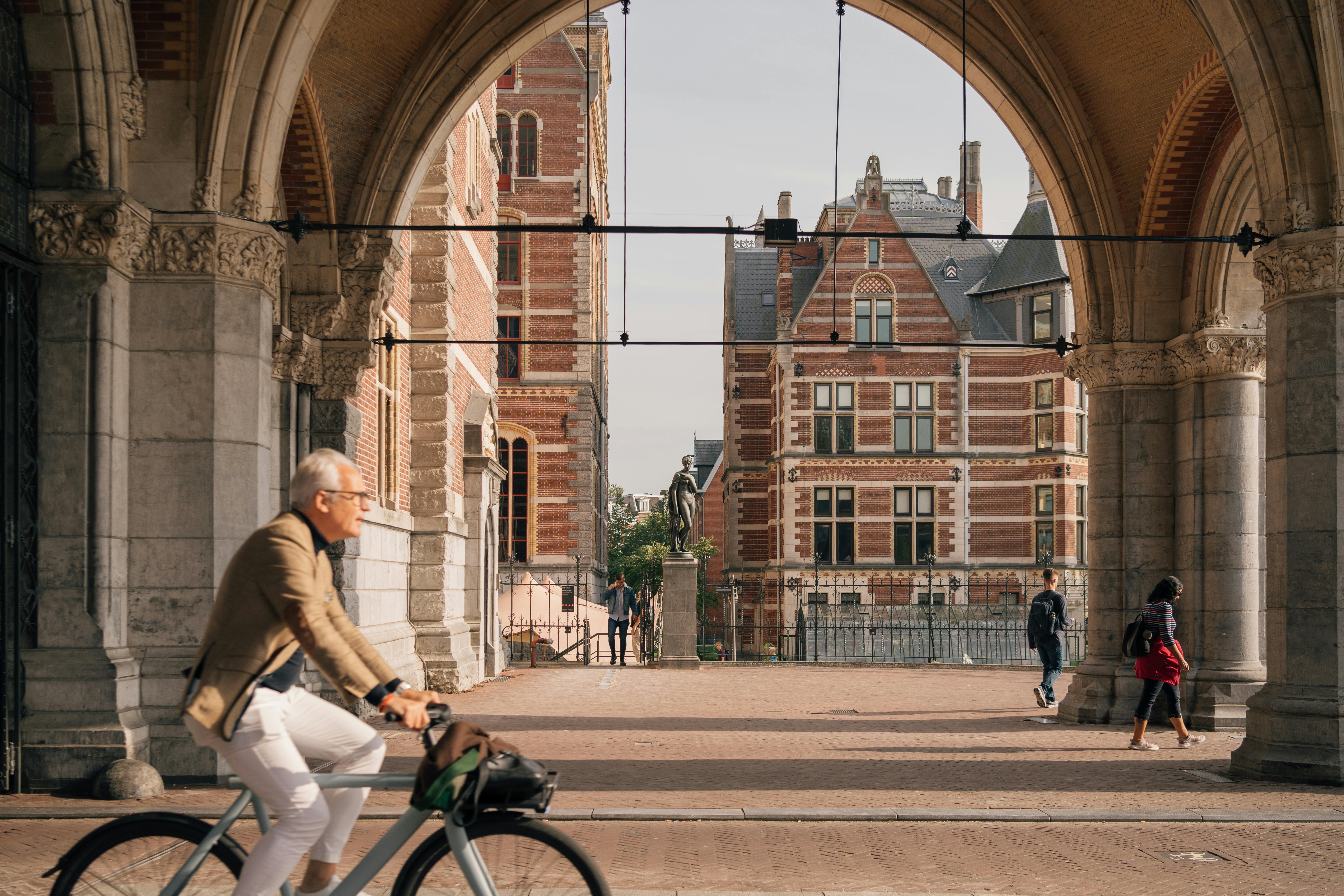 Man on a Bicycle on the Streets of Amsterdam, the Netherlands