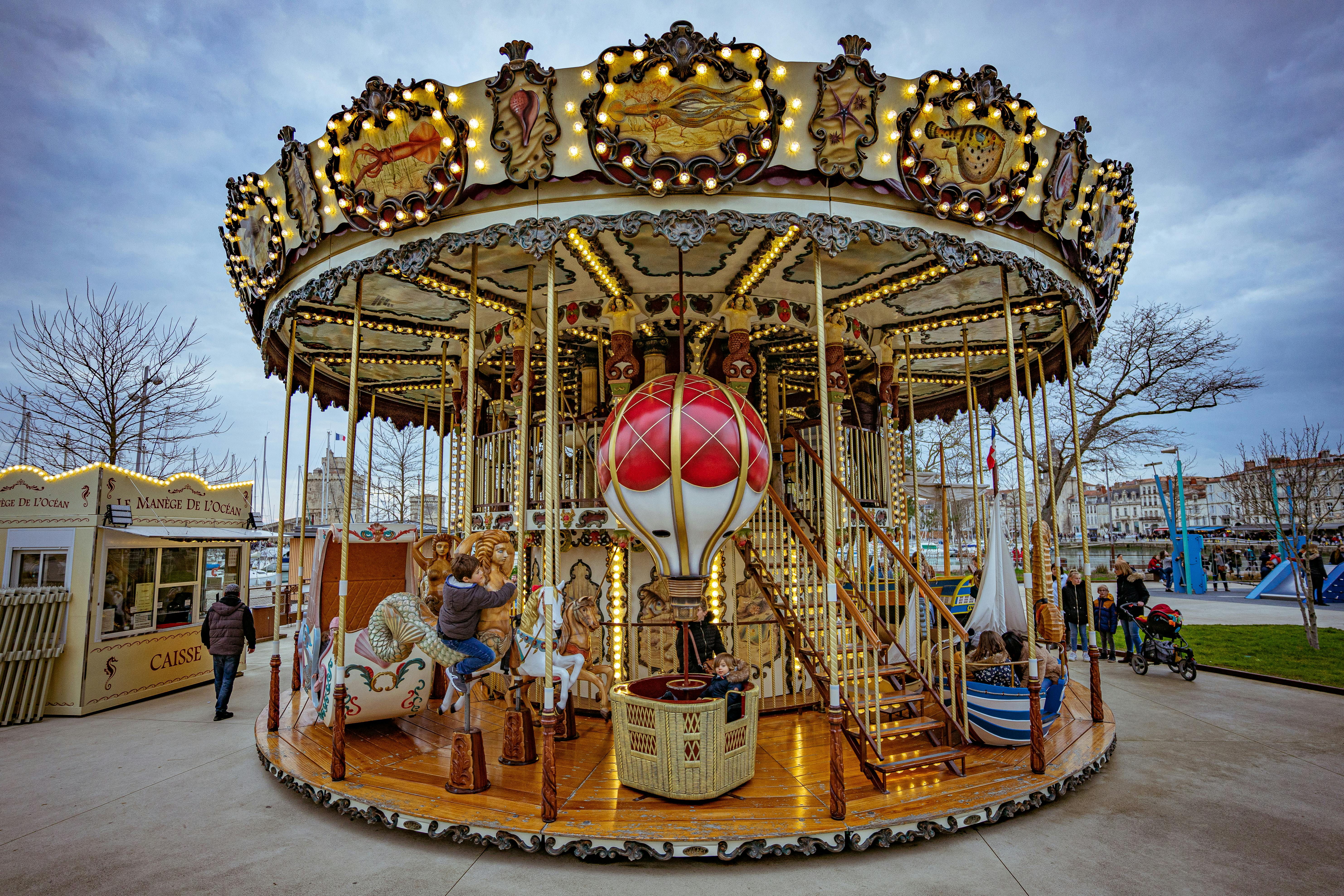 Children on a Carousel on a Christmas Market 