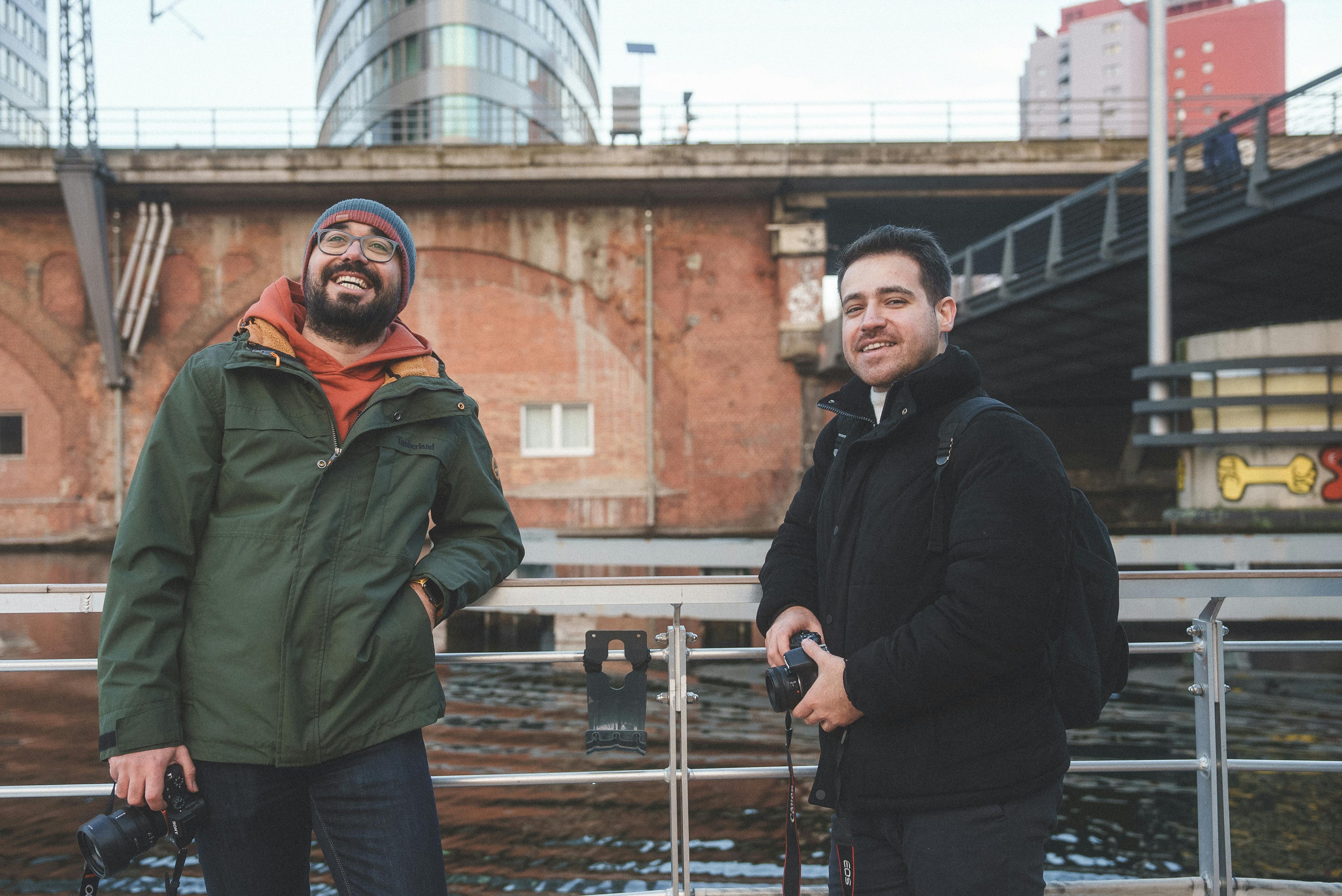 Adventurers capturing the moment by a river.