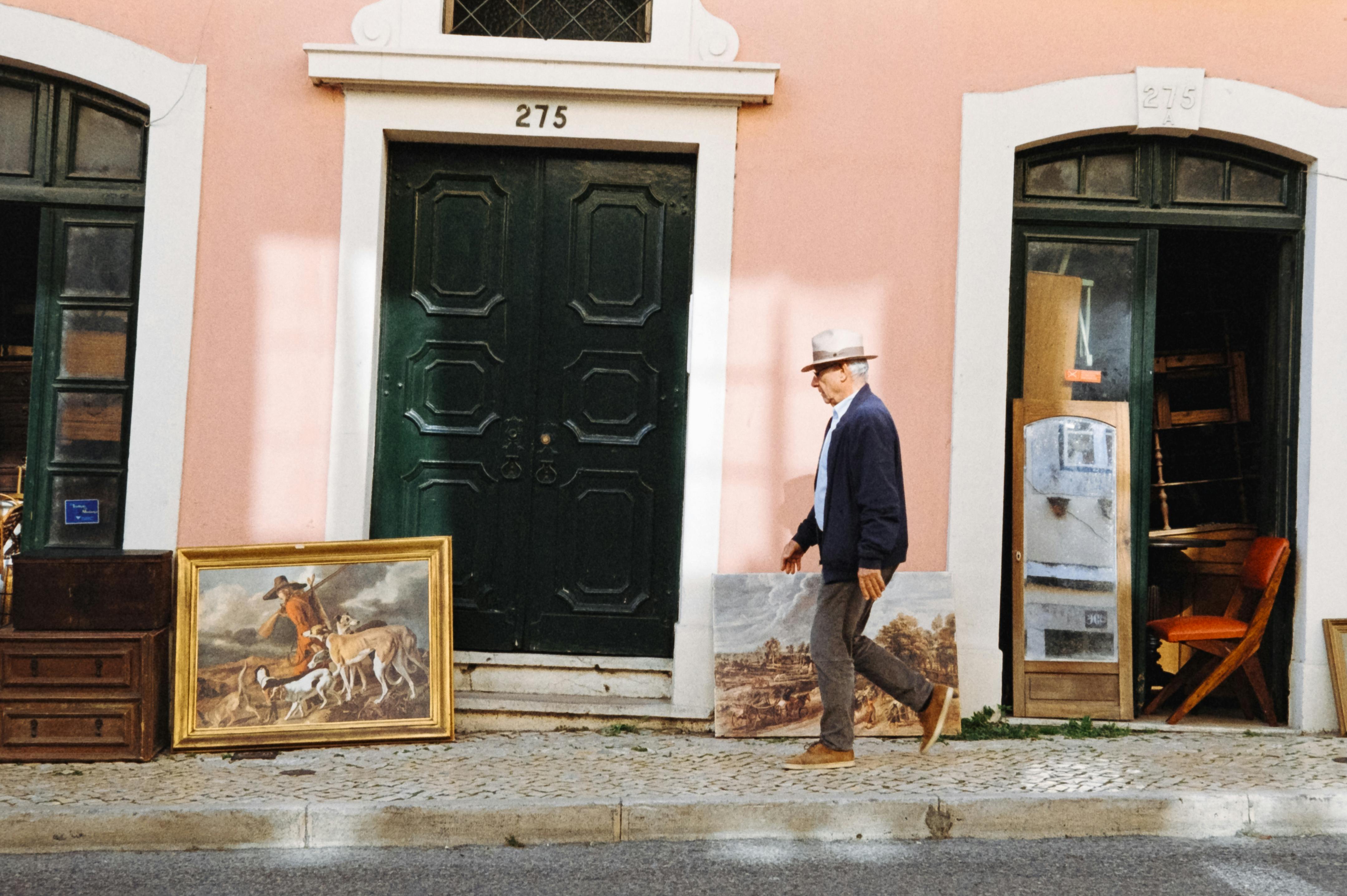 Paintings Displayed along Sidewalk