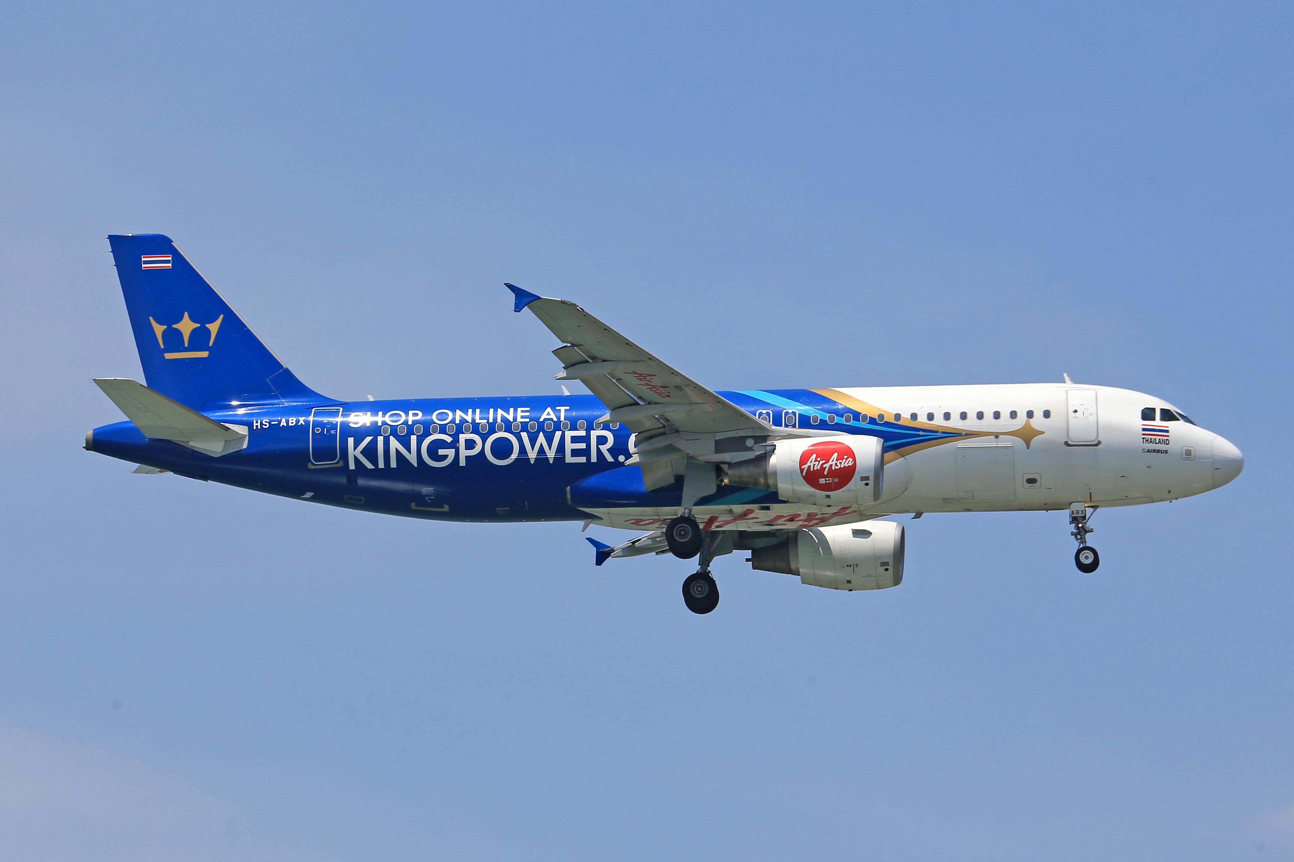 Blue Airplane in Sky