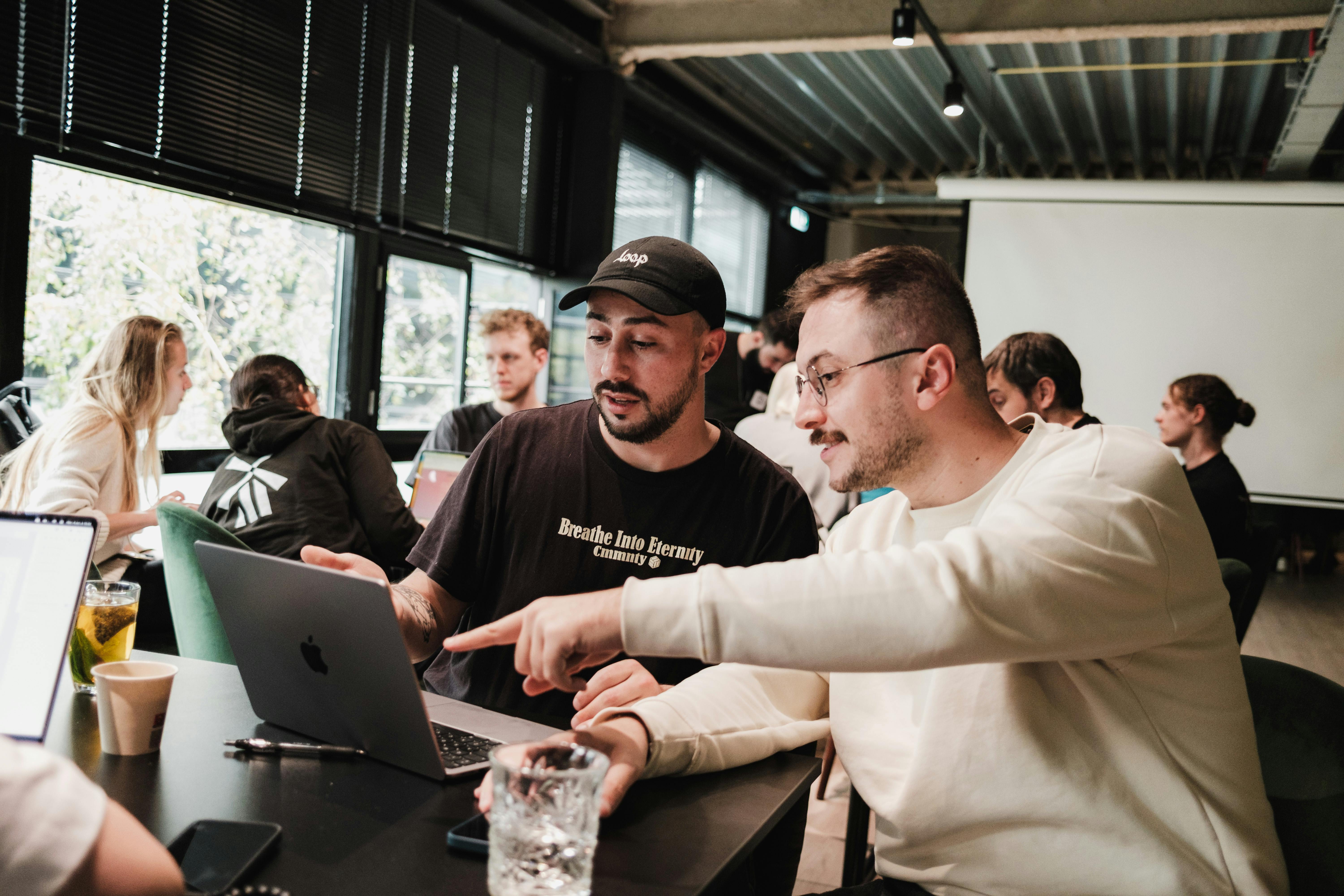 Men Sitting with Laptop and Working