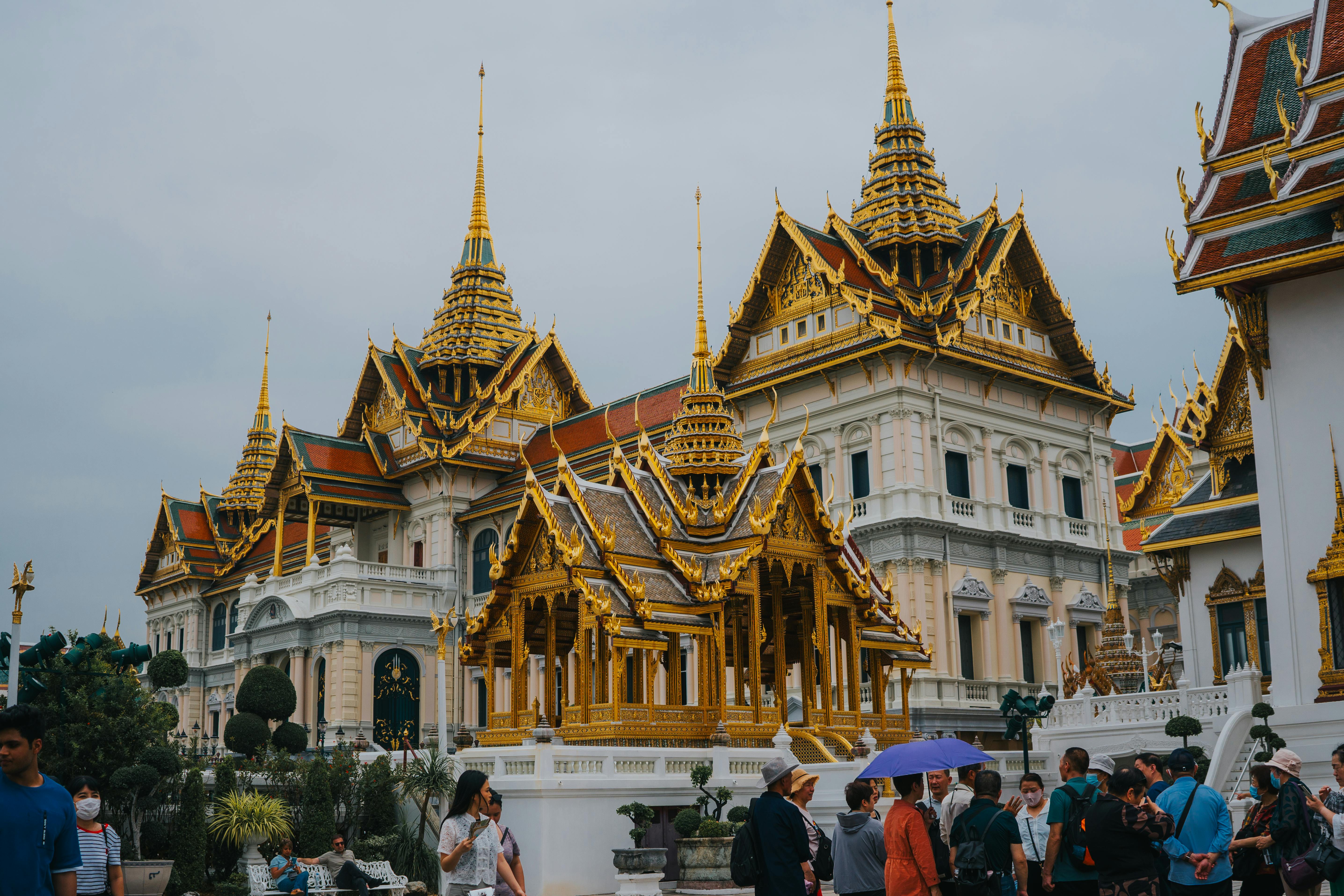 Tourists Visiting the Temple of the Emerald Buddha in Bangkok