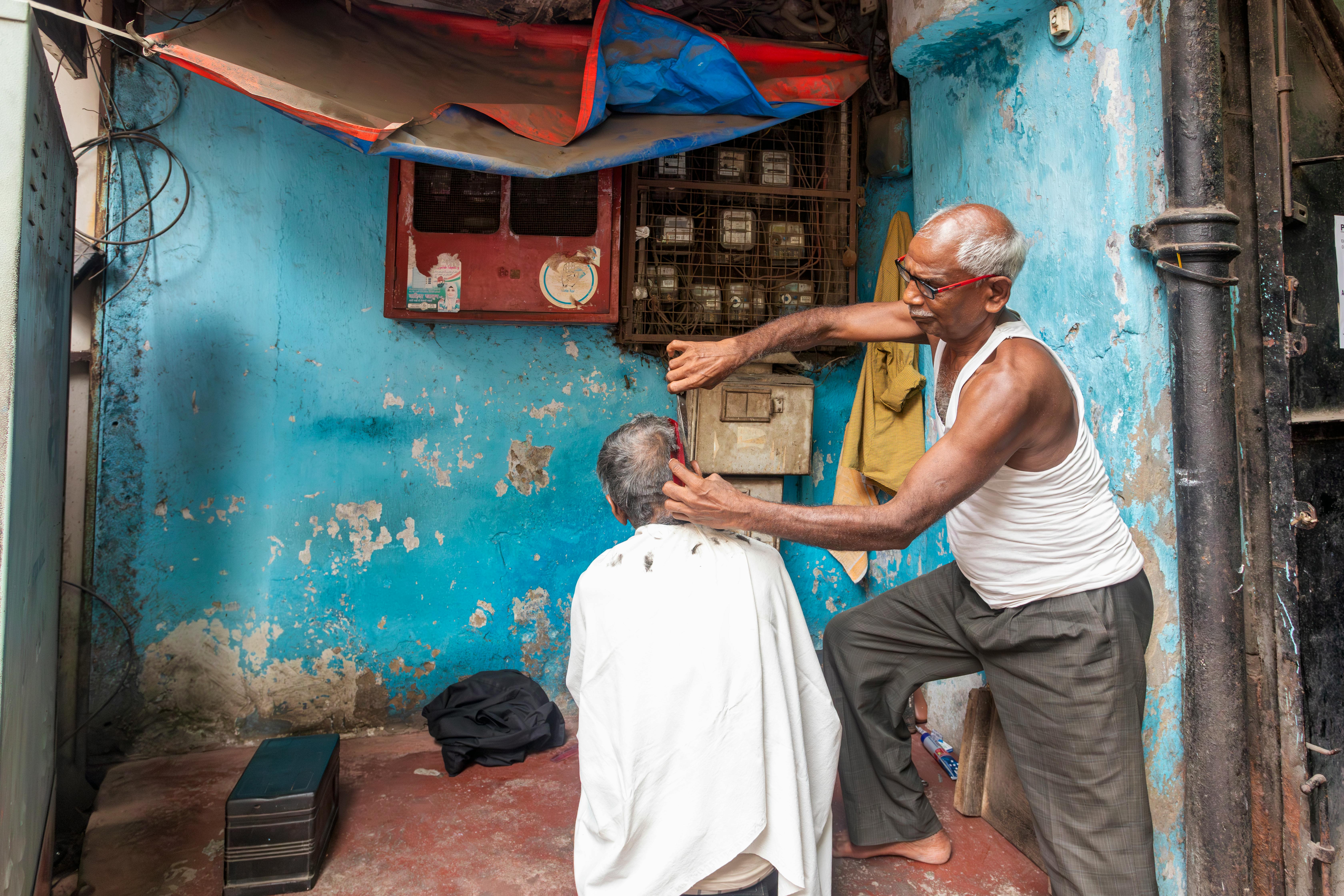 Man at Hairdresser by the Street