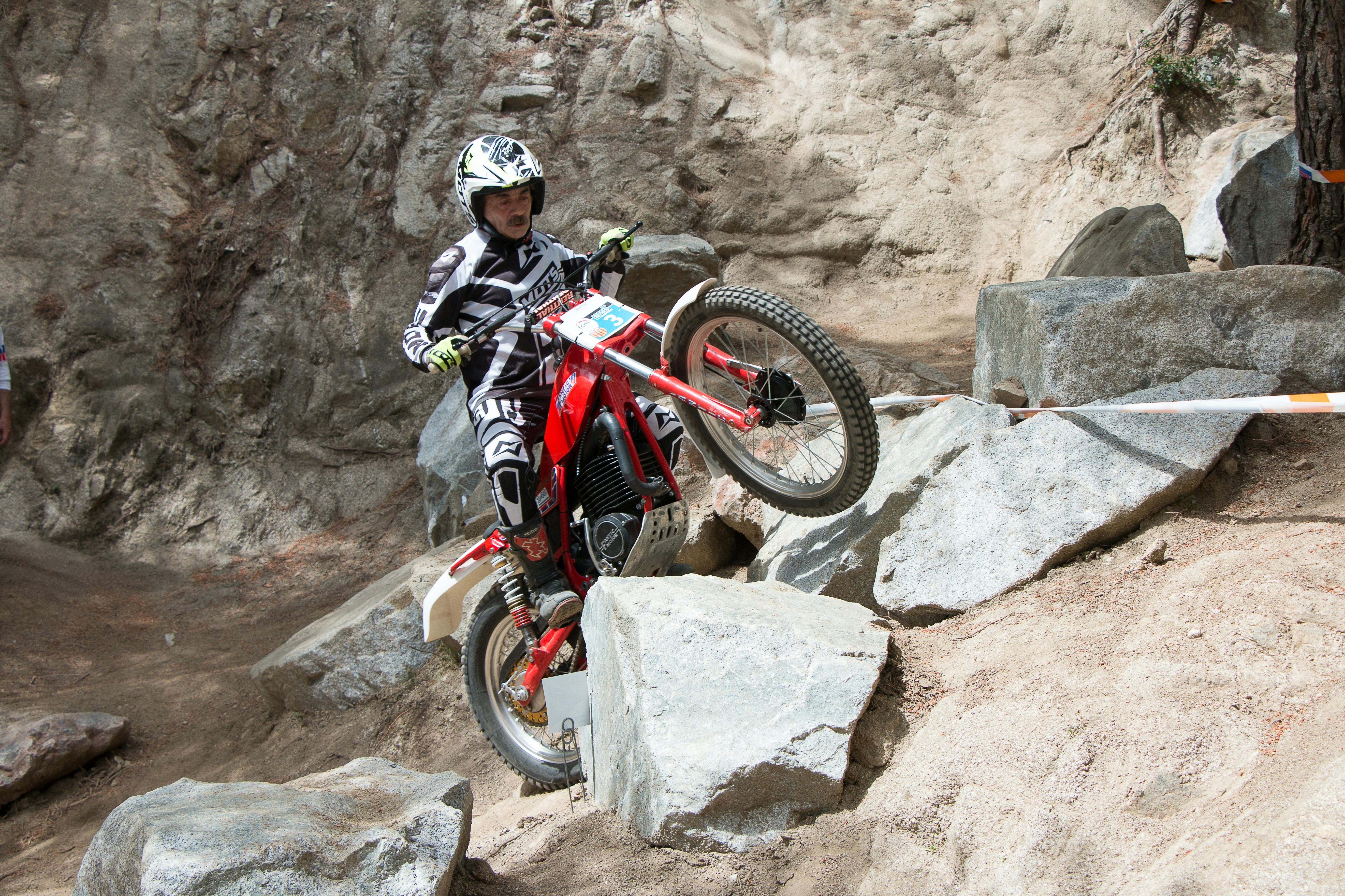 Elderly Man Riding Motocross in Race